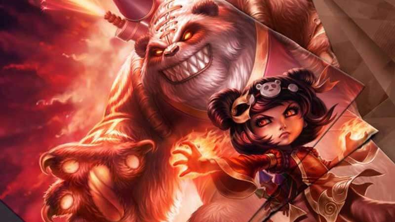 League of Legends character Annie and her giant pet bear menace an enemy against a fiery backdrop.