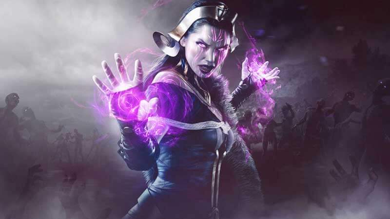 A dark, desaturated image of a necromancer surrounded by zombies as she summons magical, purple energy from her hands.