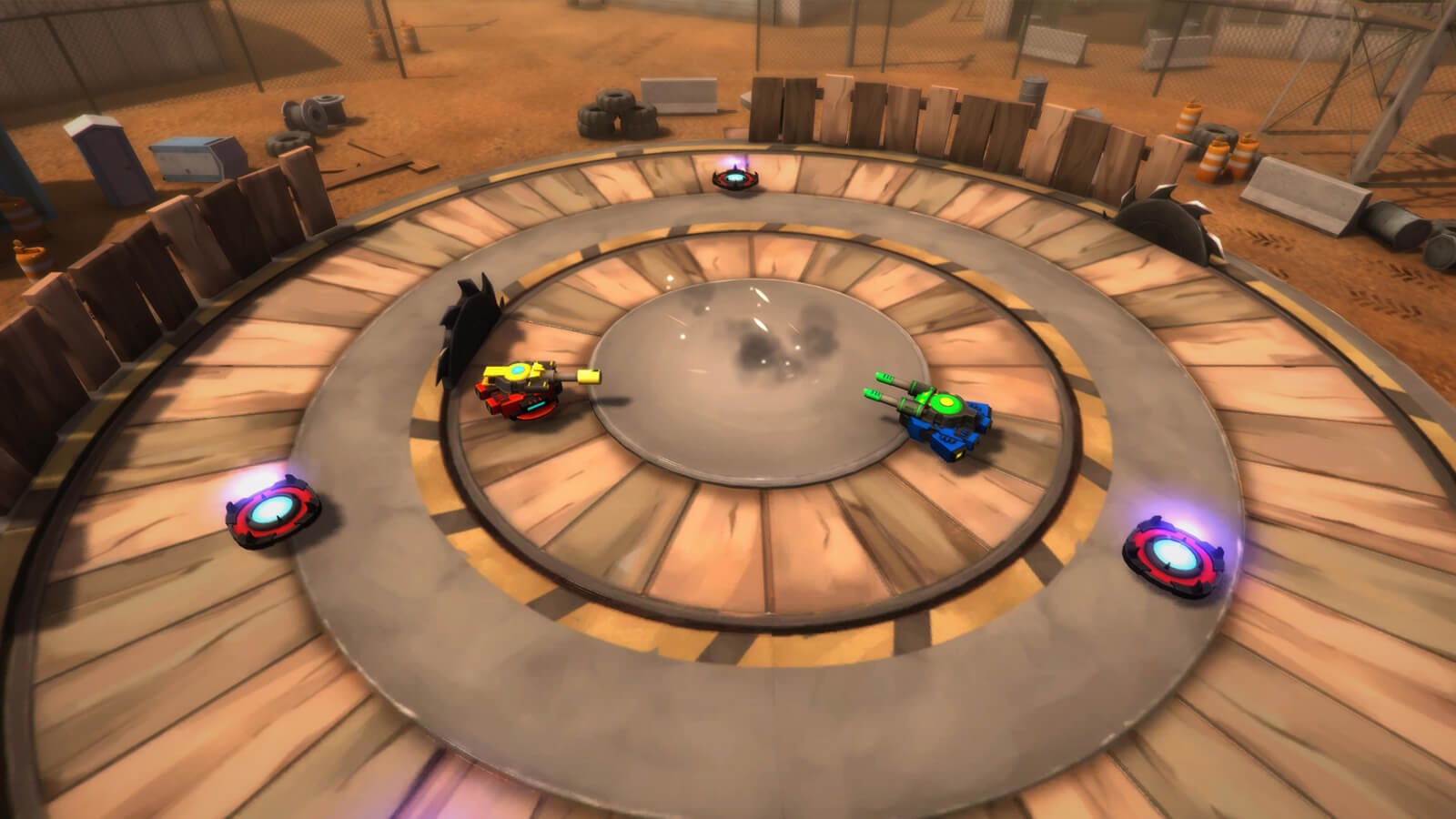 Two hover tanks face each other in a wooden battle arena with saw blades buzzing around them.