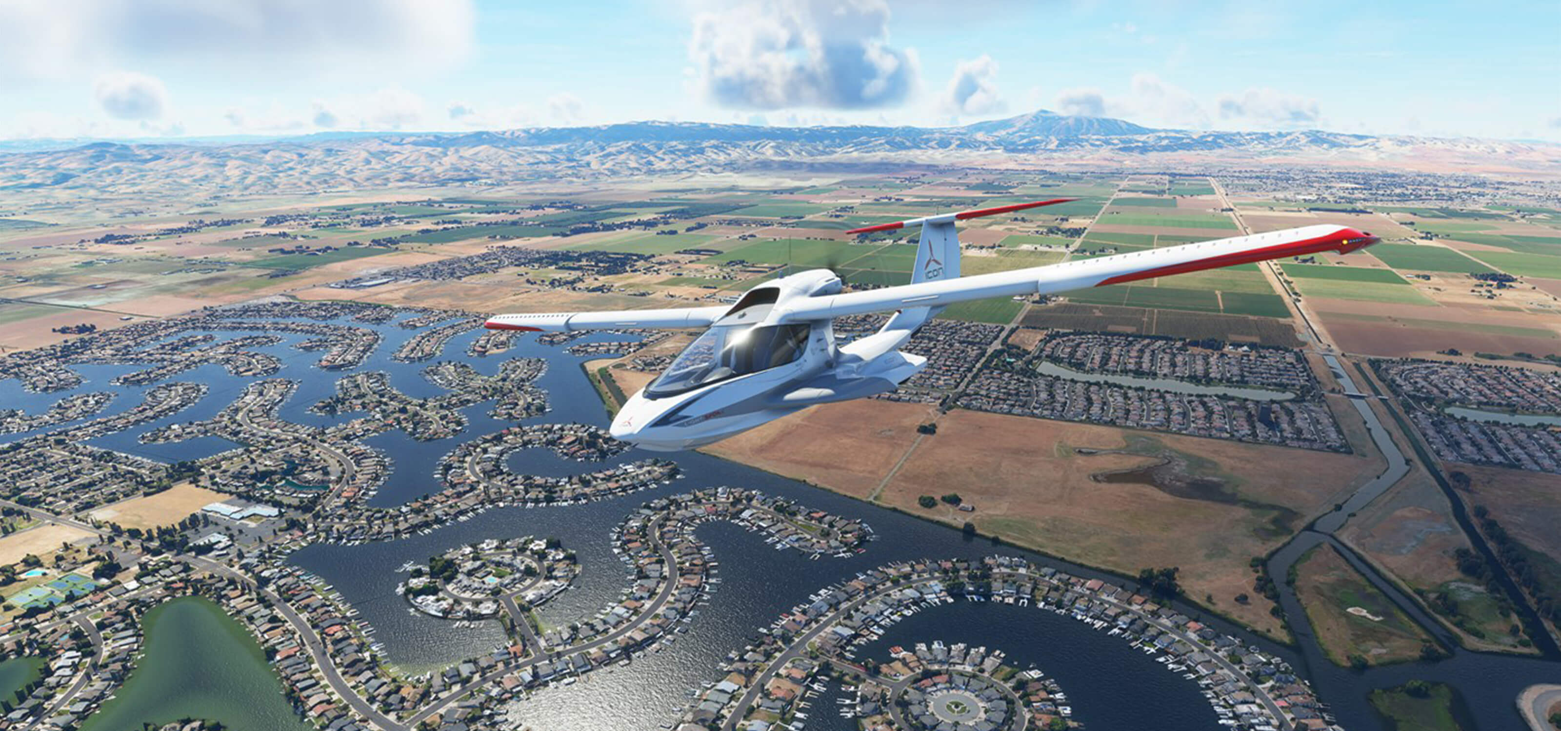A screenshot from Microsoft Flight Simulator depicting a plane flying over fields and a lake.