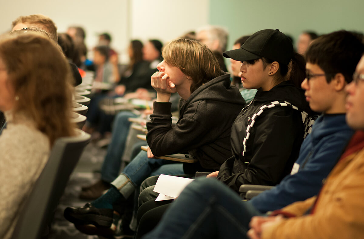 The audience at the DigiPen-hosted Bungie Career Talk listens intently to alumnus Peter Kugler