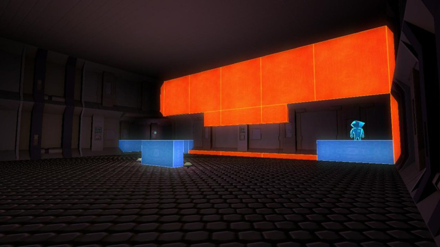Screenshot of the main character standing on a blue box in a gray room