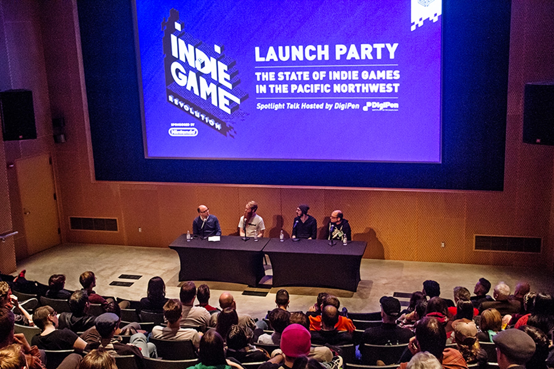 Zach Aikman speaking on a panel at Indie Game Revolution at the EMP museum in Seattle
