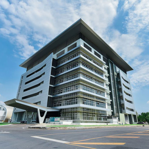 Large modern building set against a blue sky