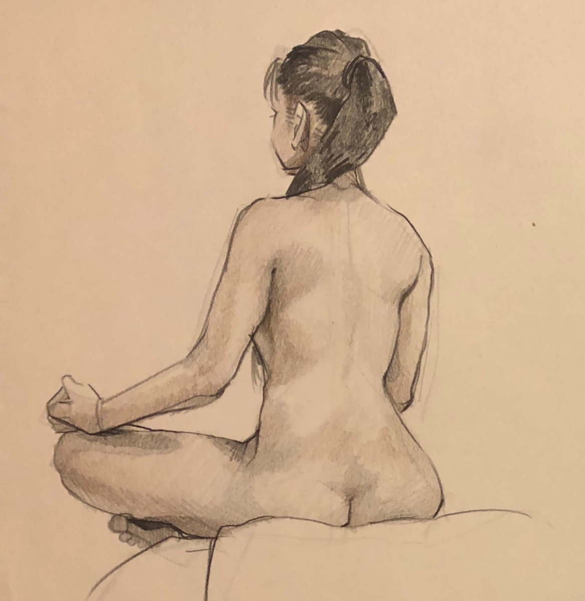 A sketch of a nude woman, sitting with her back to the artist
