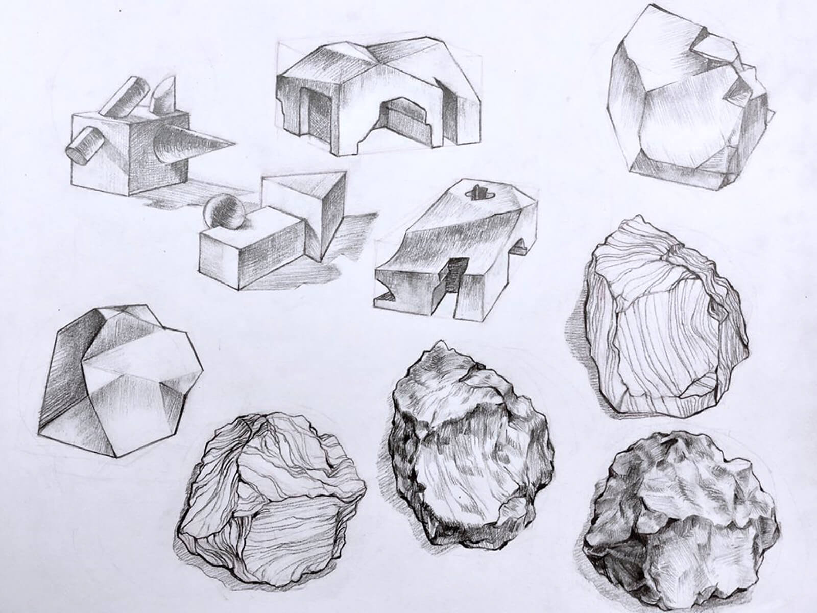 A series of pencil drawings of rocks and geometric shapes