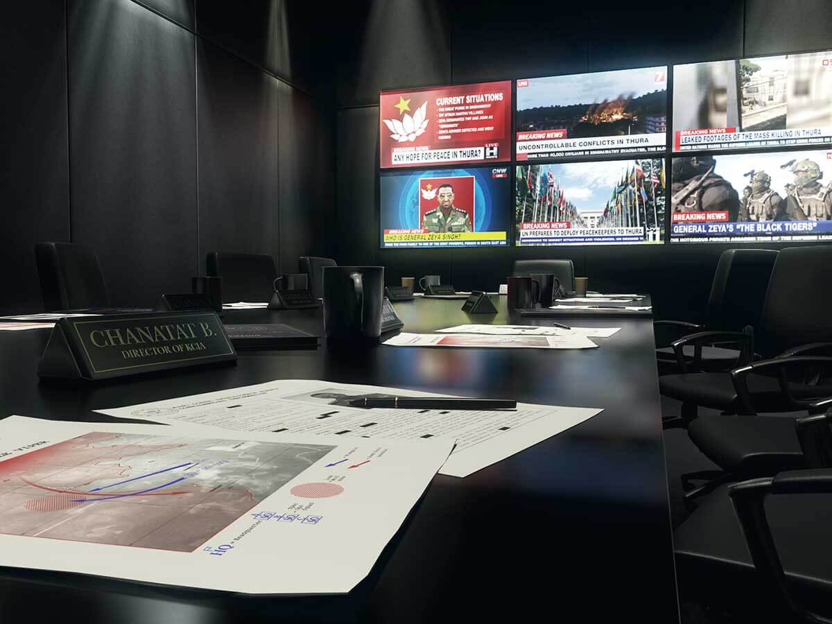 A director's desk with papers on top and televisions in the background.