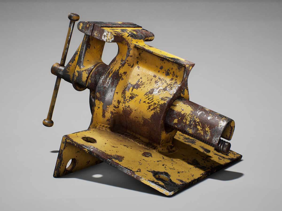 Rusted machine tool with yellow paint chipped off.