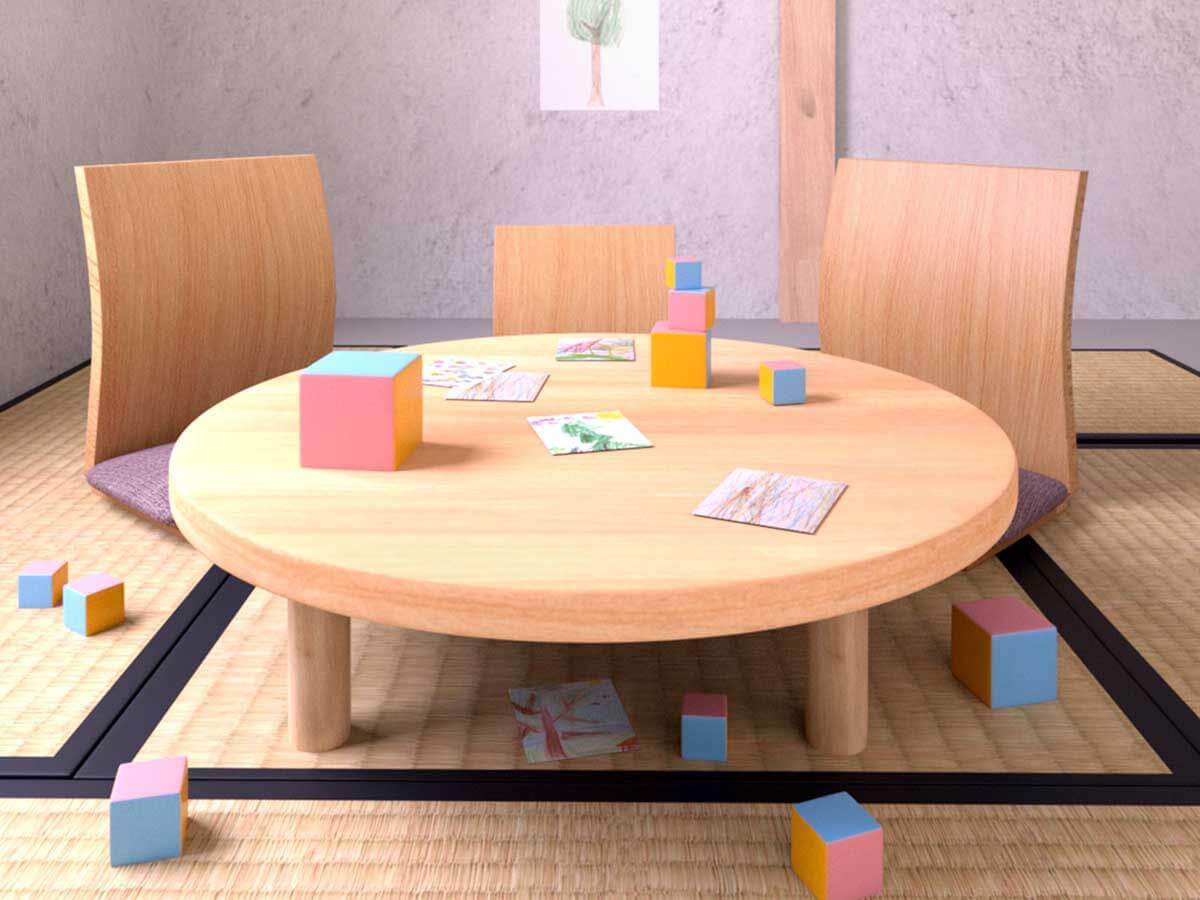 A room with children's toy blocks and drawings.