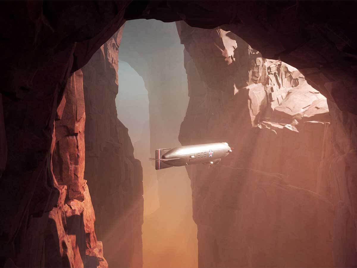 A zeppelin flies through a massive, rocky canyon.