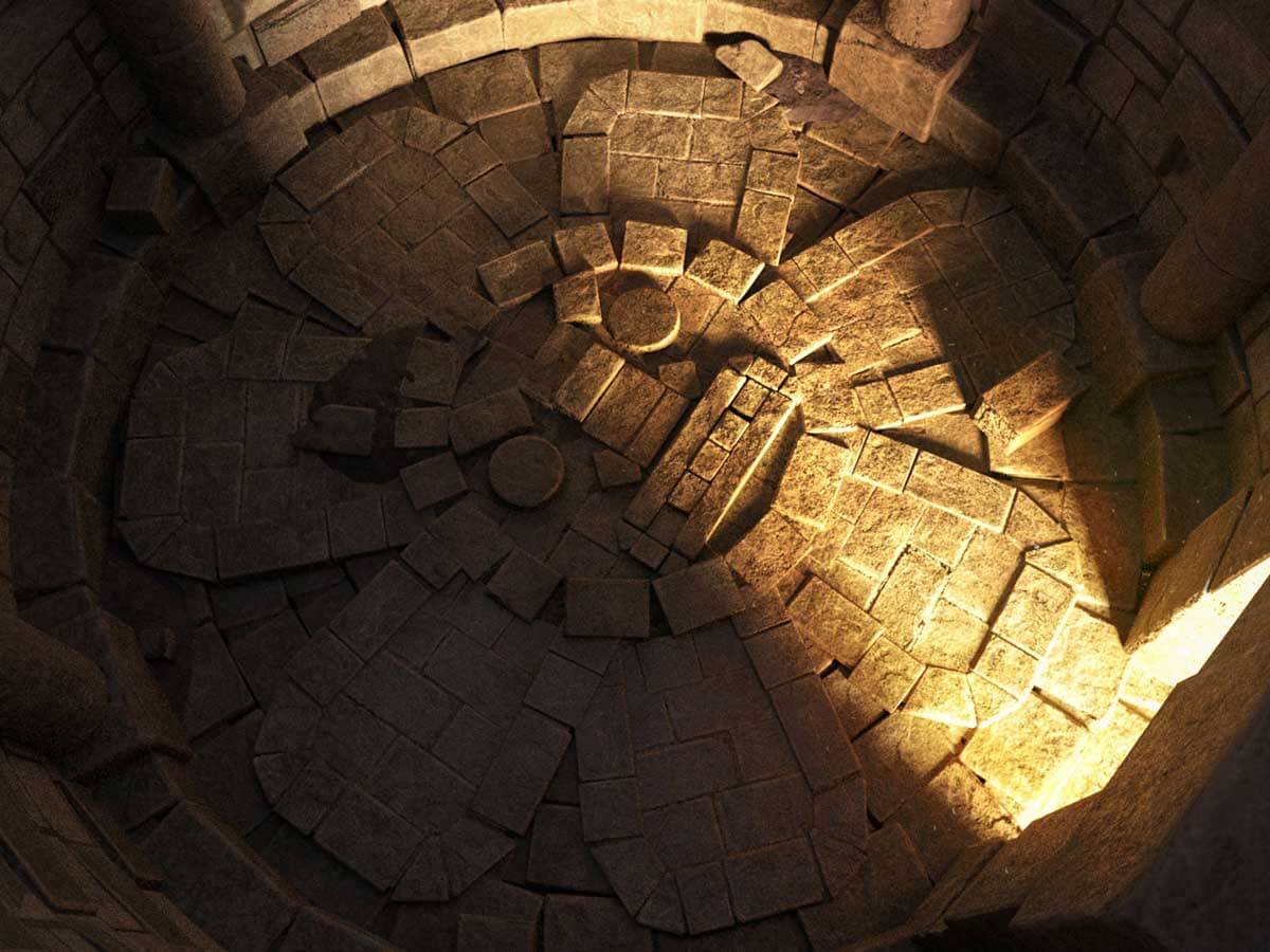 A circular room made of stone bricks with an angry face on the floor.