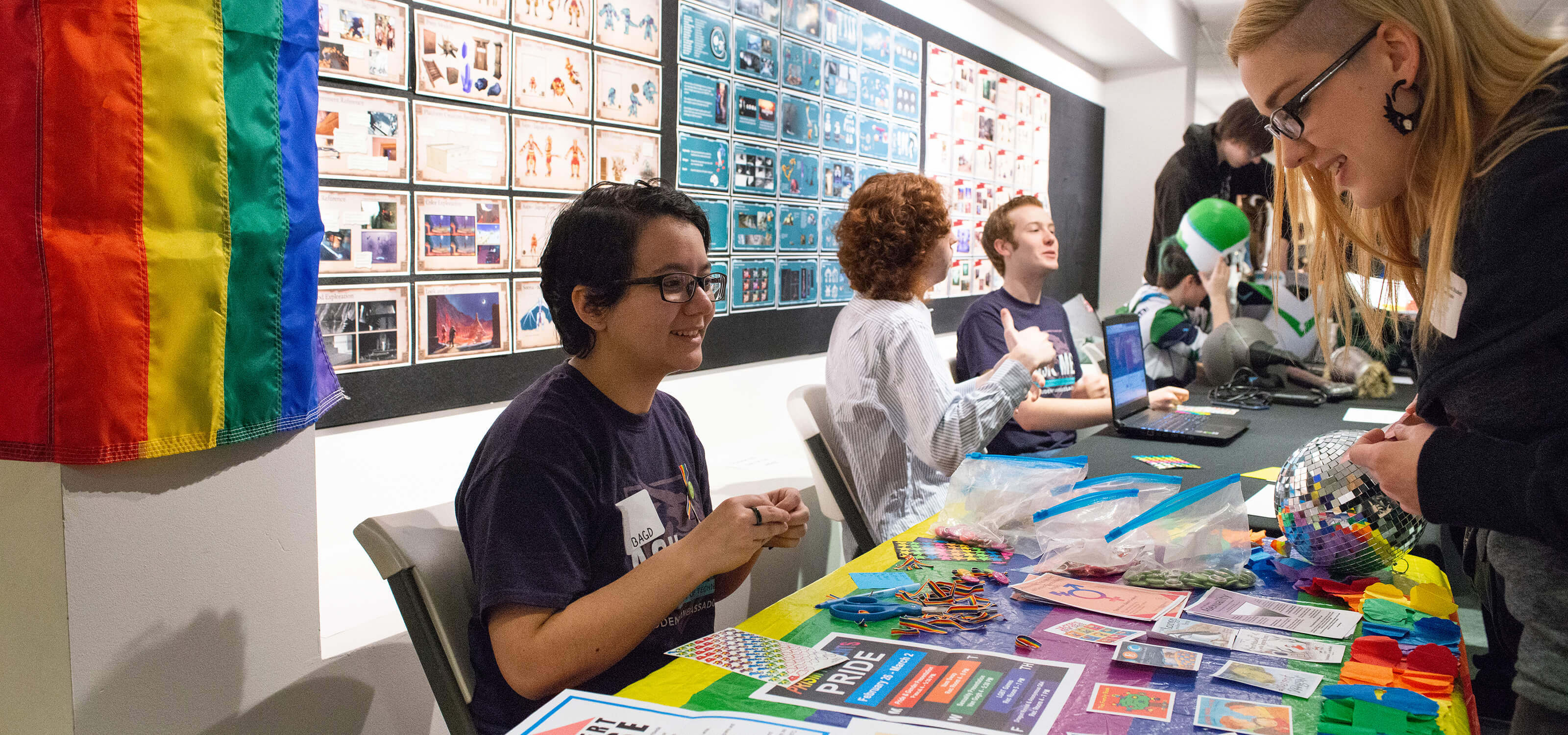 A DigiPen student explaining PRISM, the student-run LGBTQA Club and Gay-Straight Alliance club