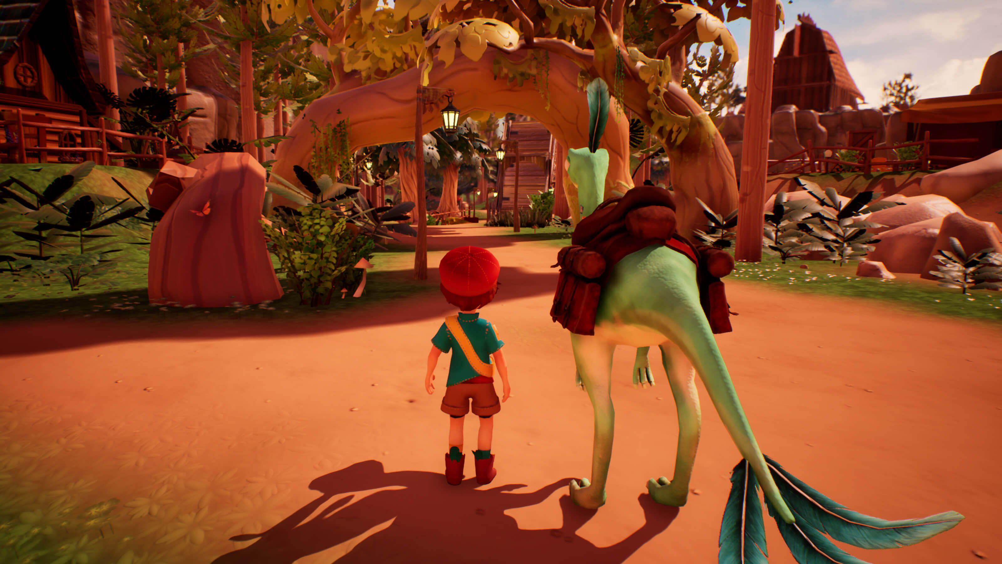 A boy stands next to his saddled-up dinosaur in the town of Cretaceous Cliffs.