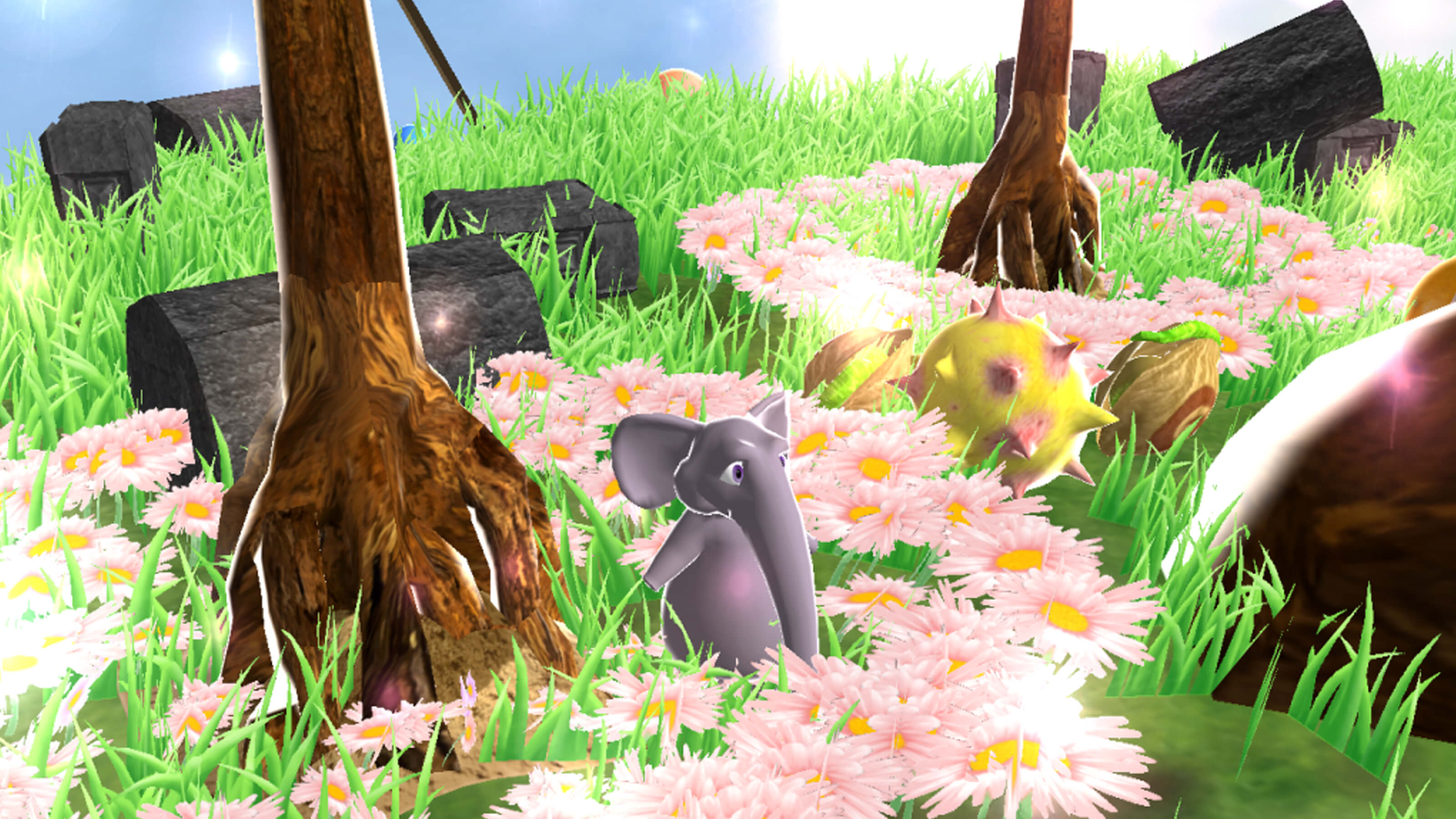 An elephant stands in a field of pink flowers.