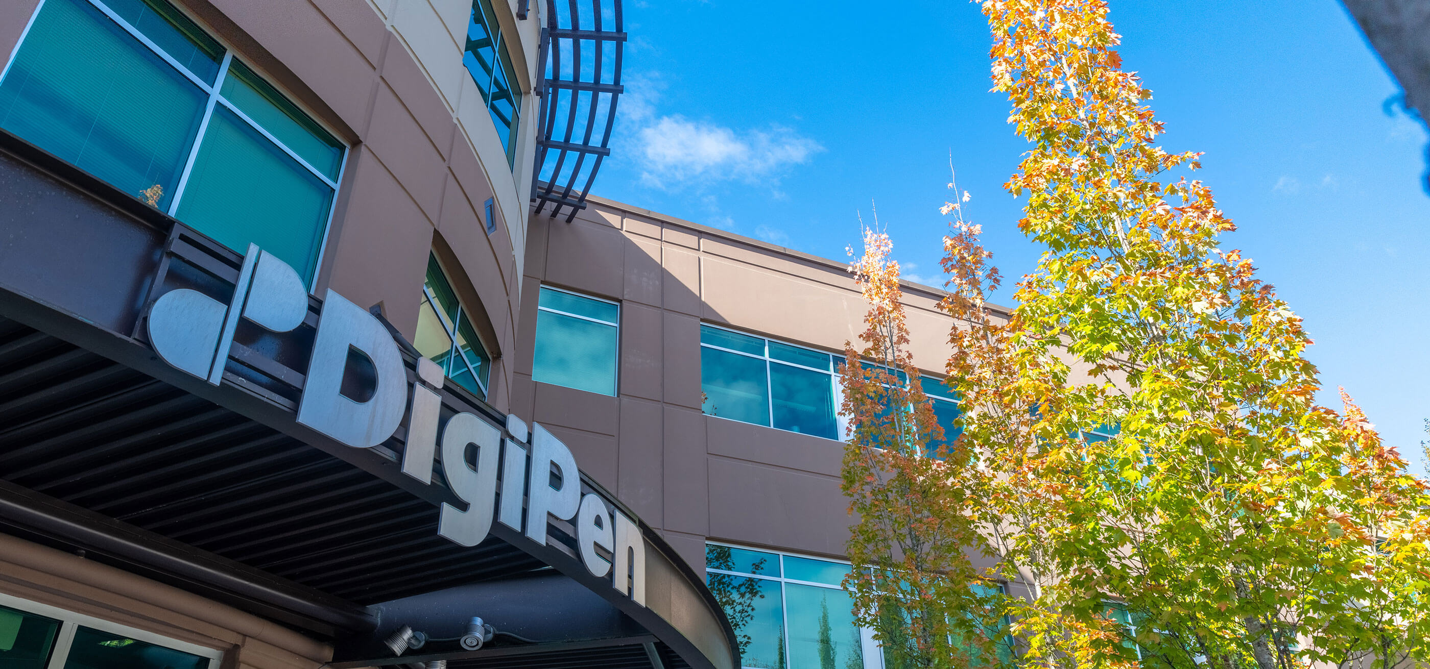 A low angle exterior shot of DigiPen's main campus building.