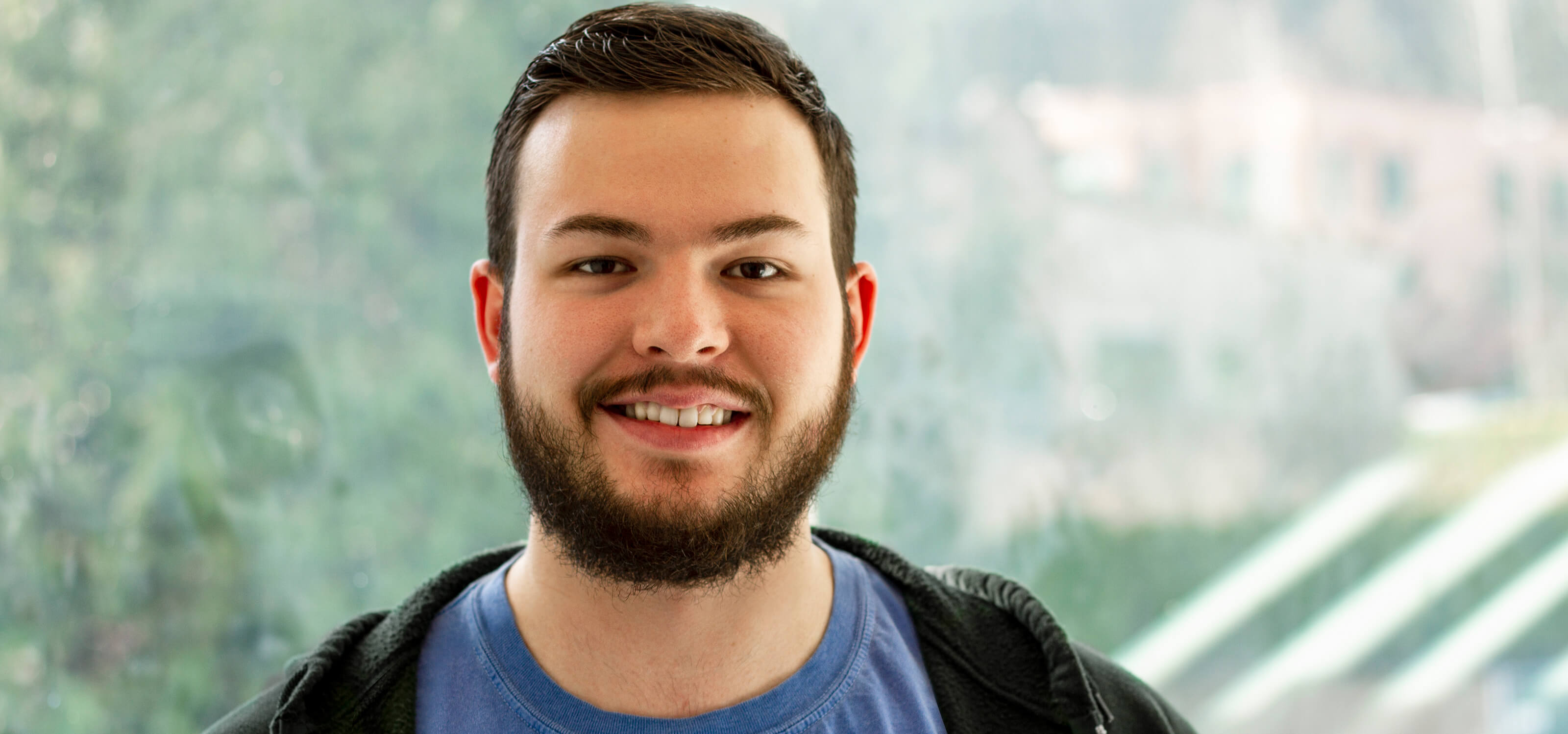 A profile shot of BS in Computer Science graduate Allen Deutsch.