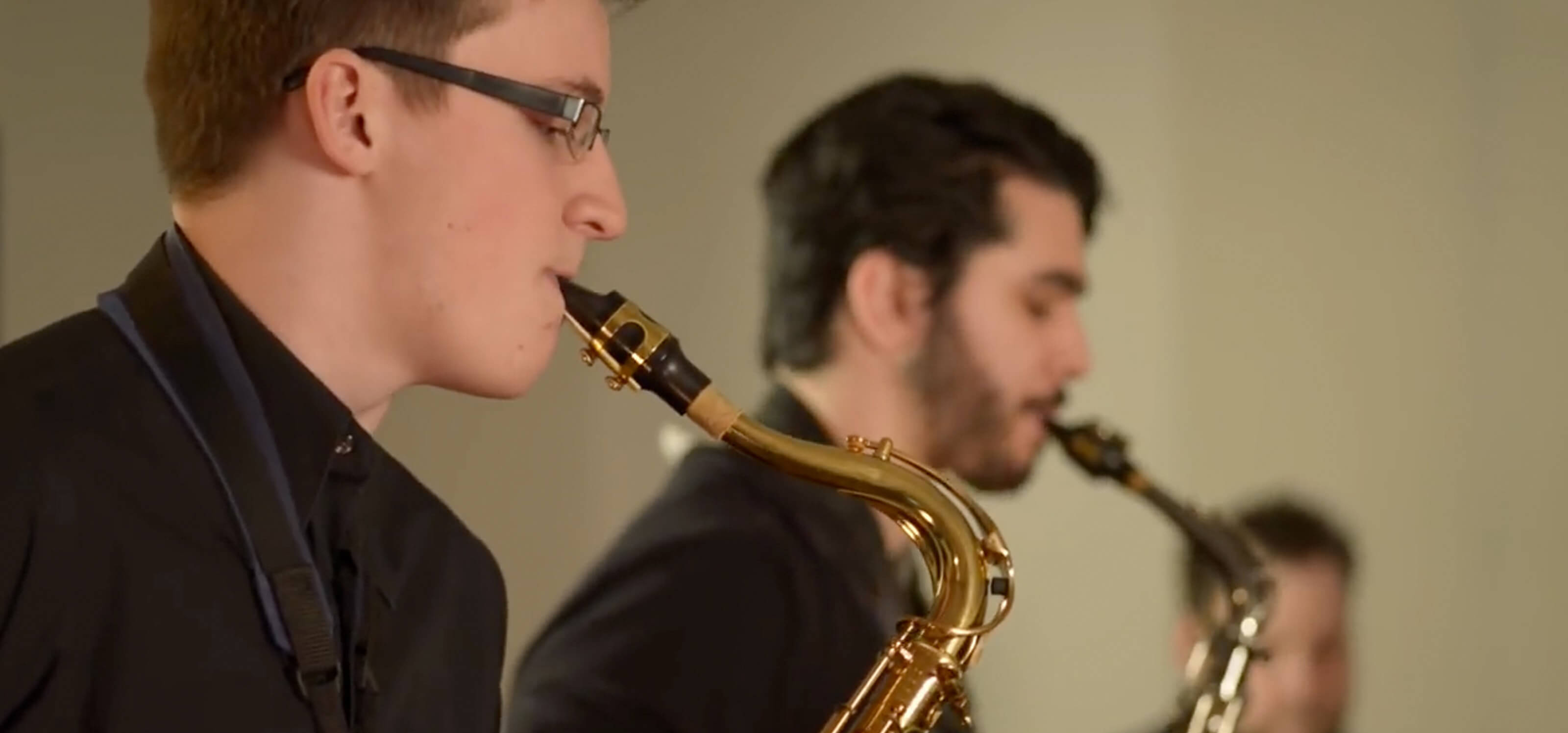 Screenshot from the DigiPen Jazz video All Good, featuring students playing saxophones