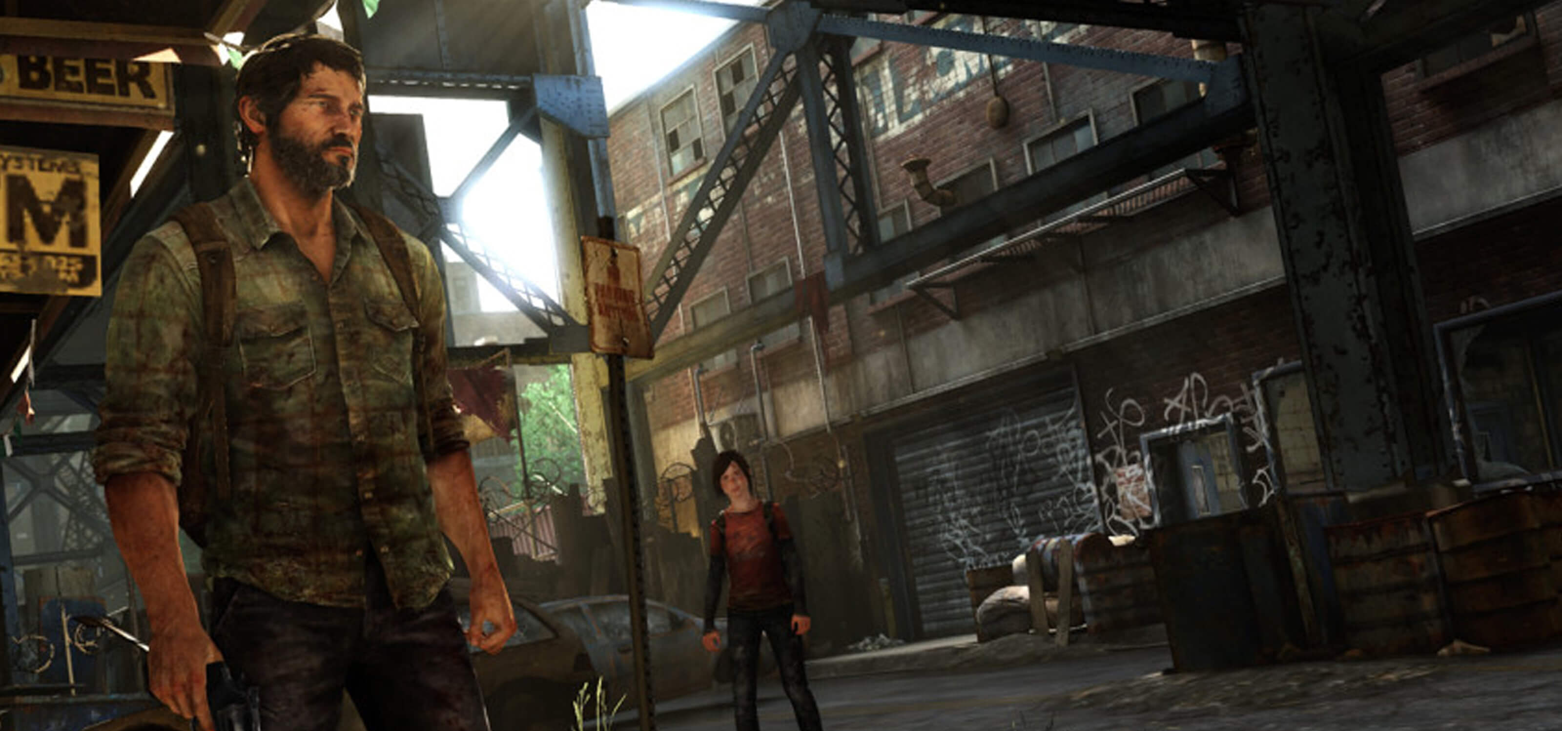 Screenshot from the Naughty Dog game The Last of Us, featuring two characters in a graffiti-covered alley