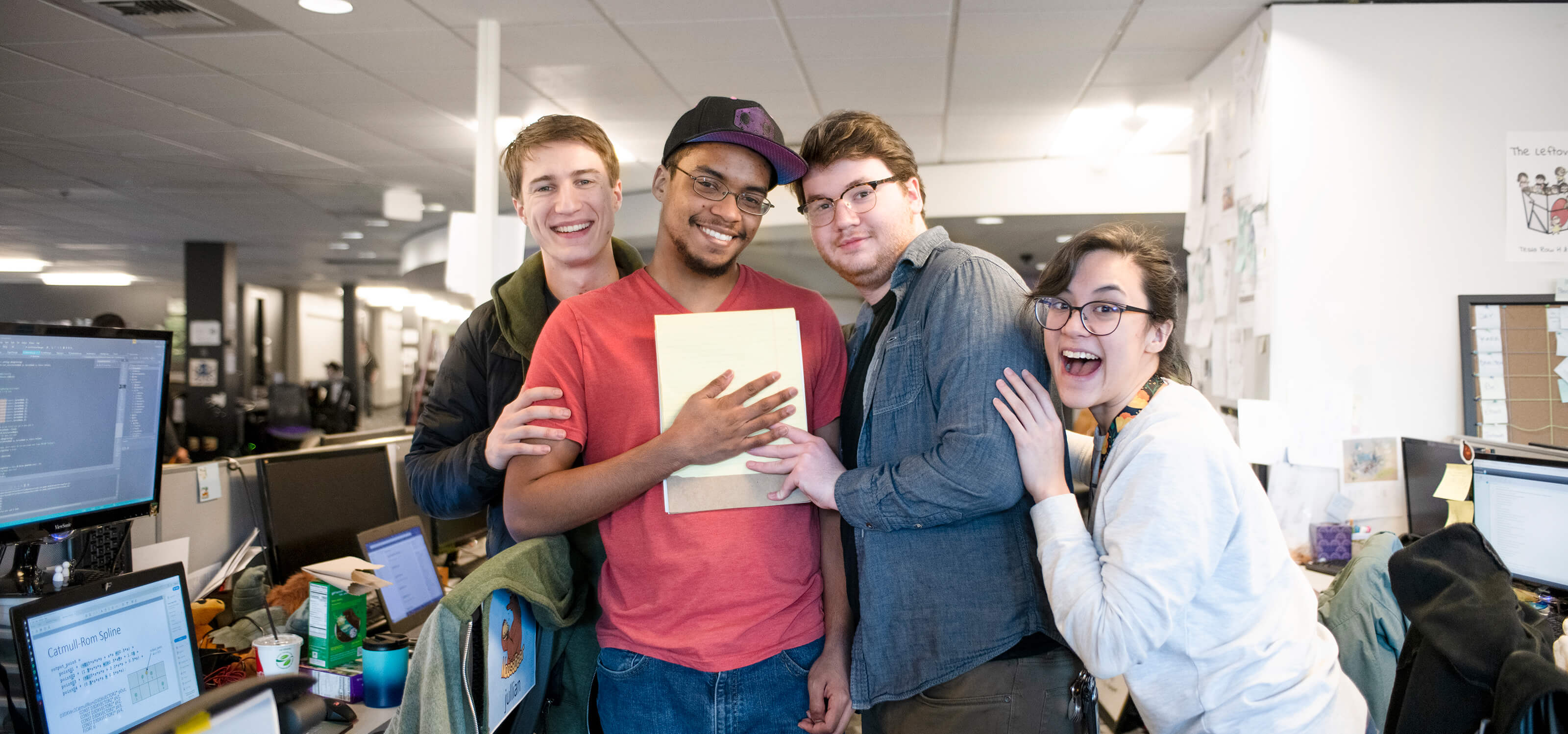 A group of DigiPen students smile for the camera