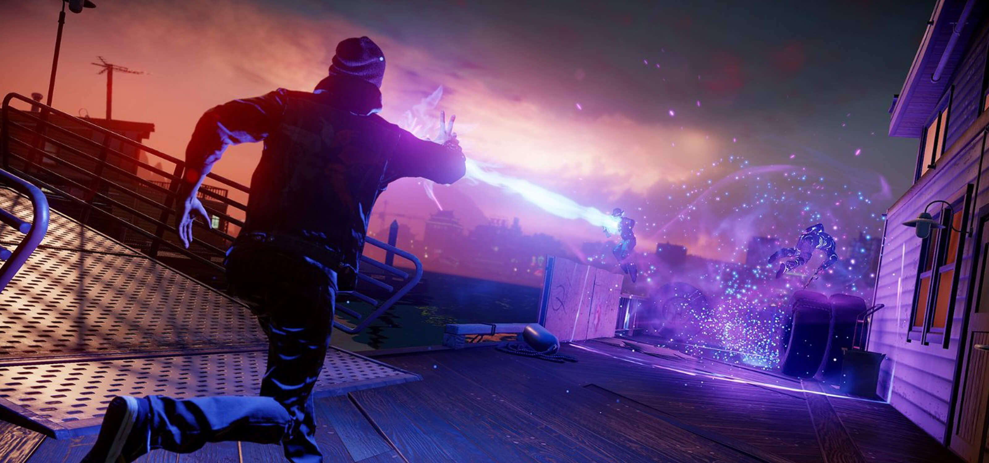 Screenshot of Infamous Second Son protagonist Delsin Rowe on a dock at night, running toward two assailants