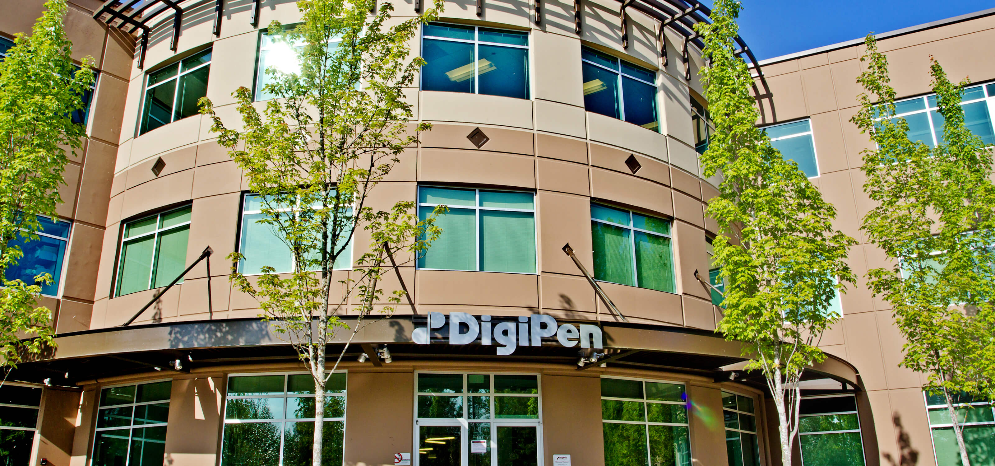 Looking up at the DigiPen building on a sunny day