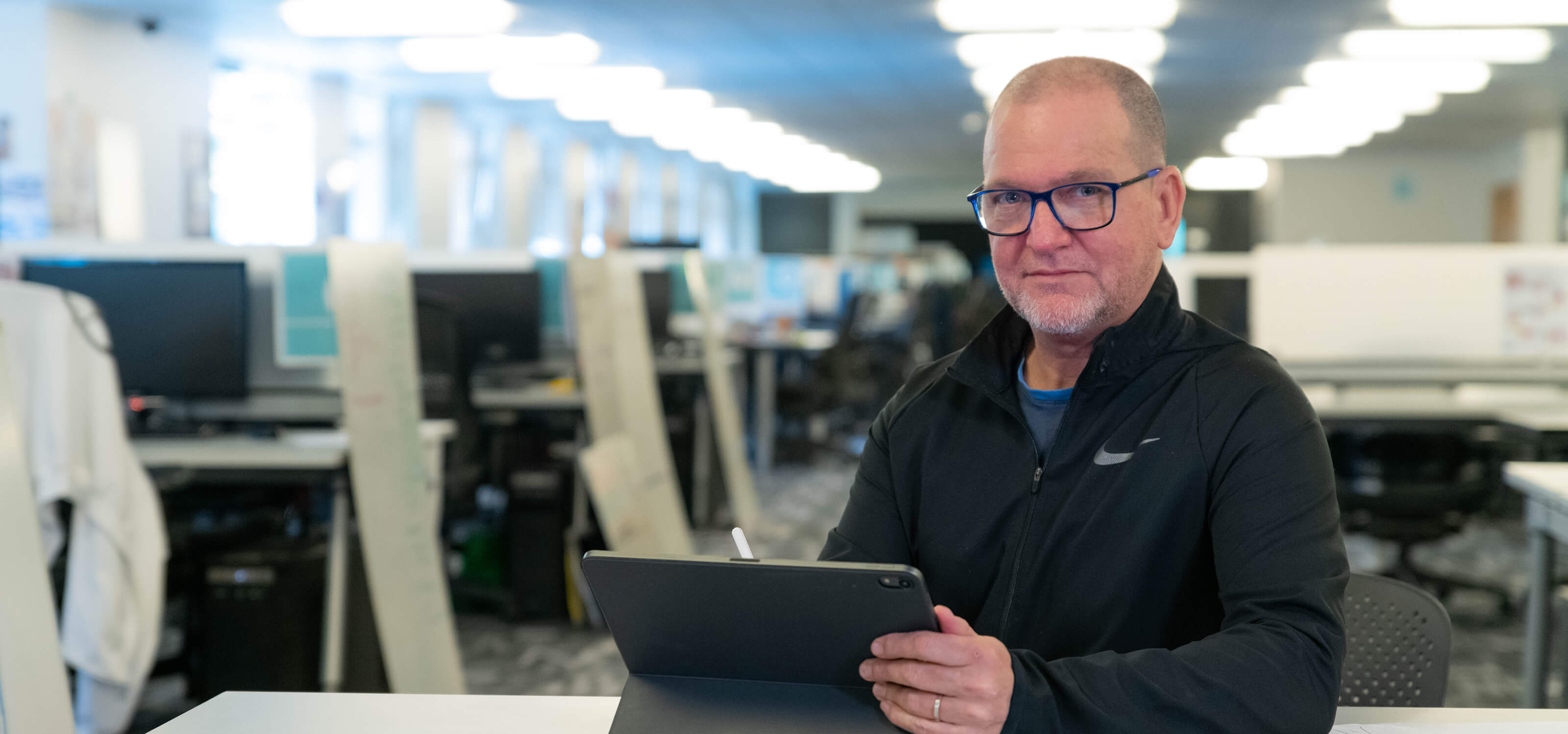 DigiPen's Jazno Francoeur sits in a computer lab