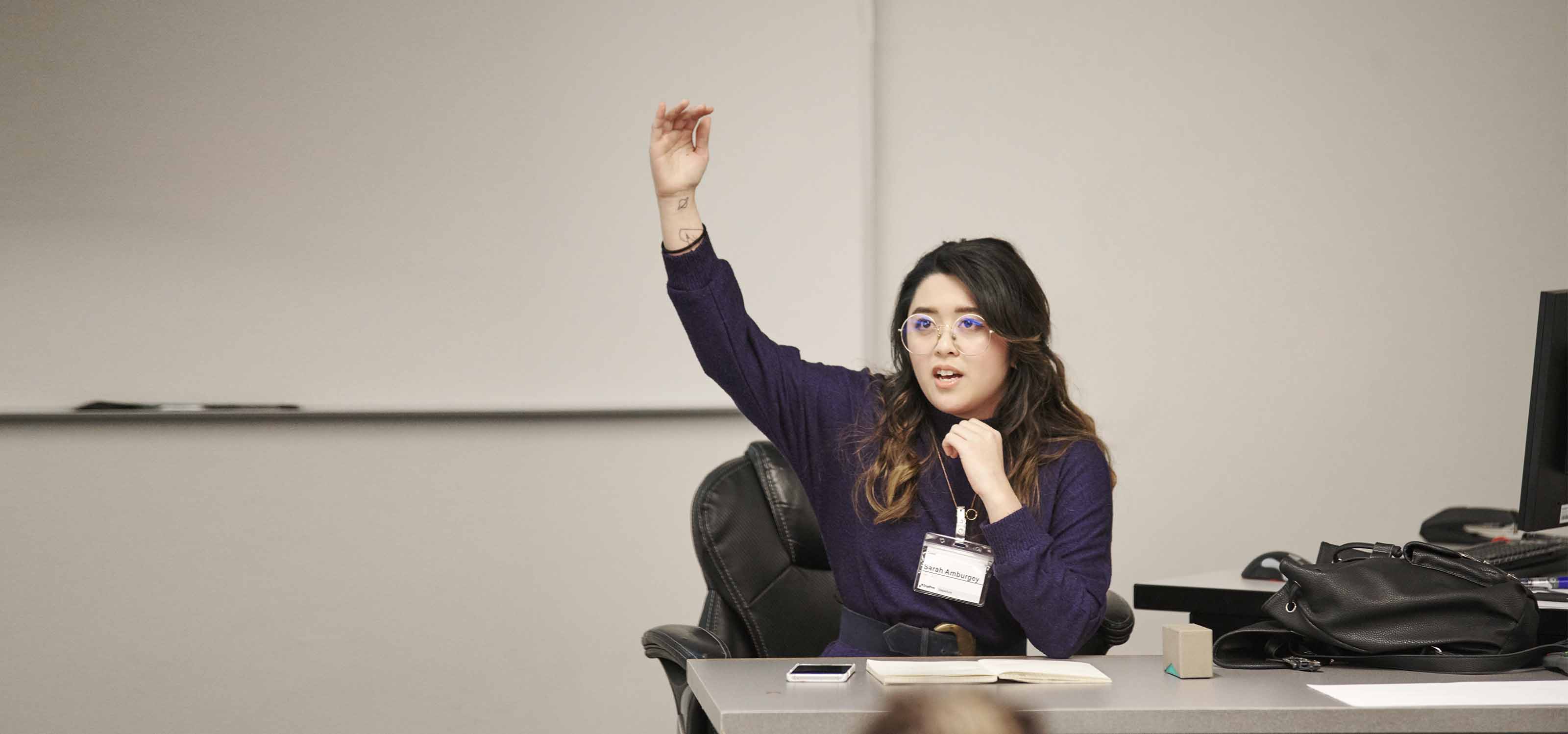 Sarah Amburgey gestures as she speaks to the audience