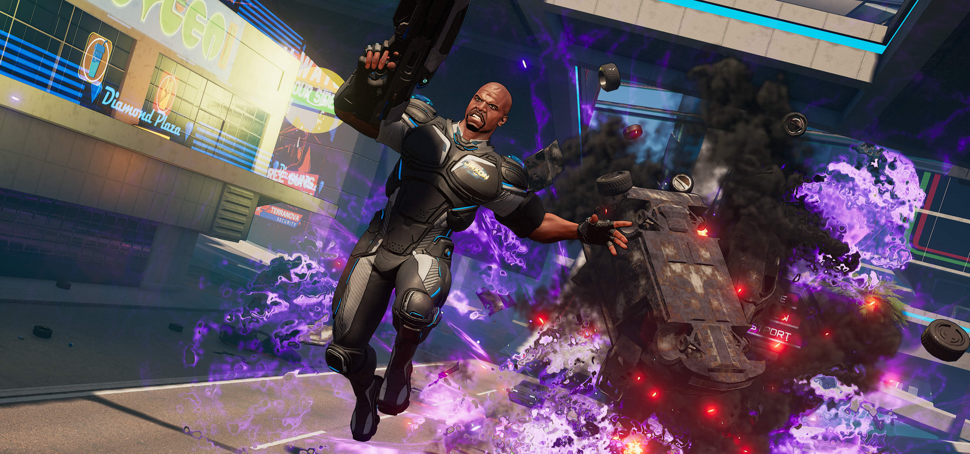 A man in a futuristic black jumpsuit leaps away from a purple-hued explosion of a truck overturning behind him on a road