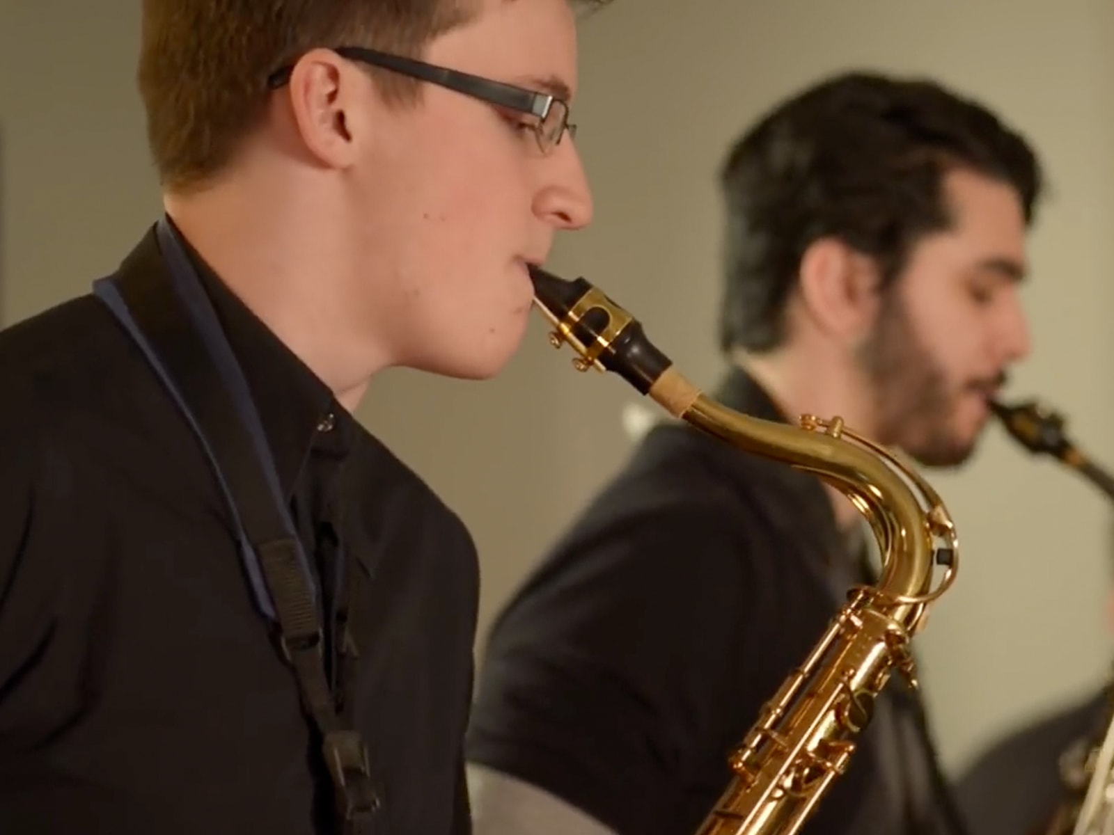 Screenshot from the DigiPen Jazz video All Good, featuring students playing saxophones