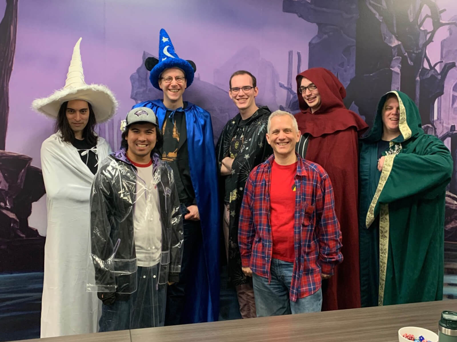 Corey Bowen and fellow Council of Colors members pose wearing variously colored wizard robes.