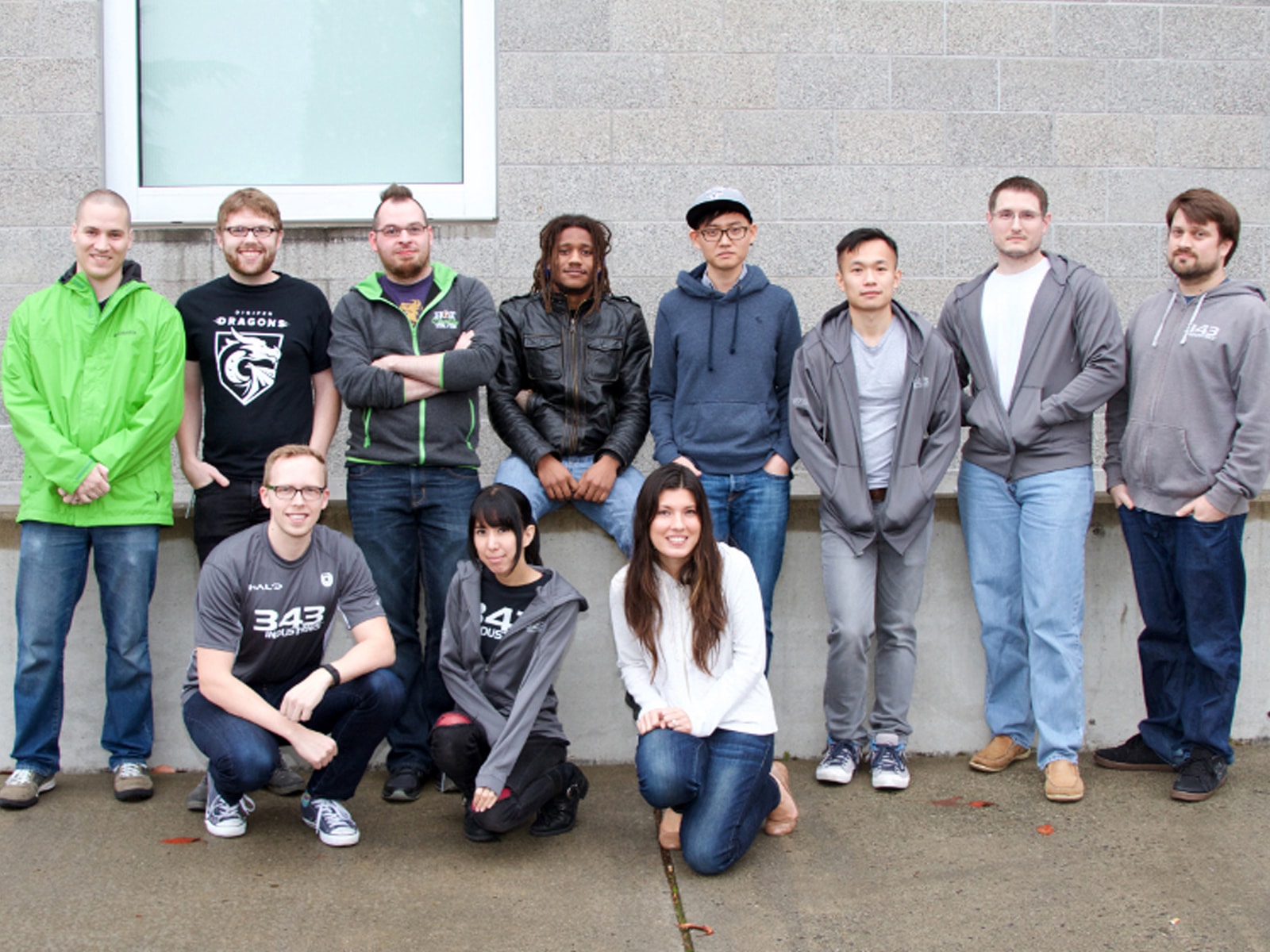 Group photo of 11 DigiPen alumni who worked on Halo 5