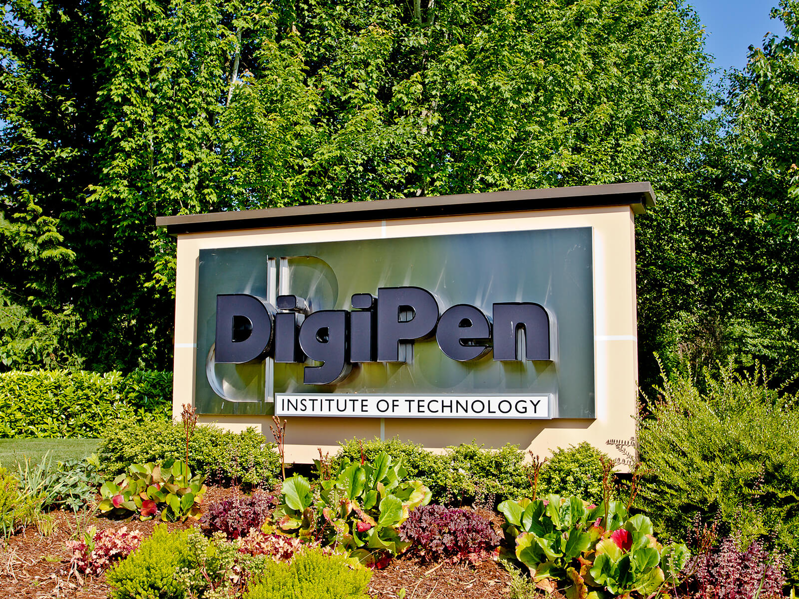Sign with DigiPen logo in front of the Redmond campus