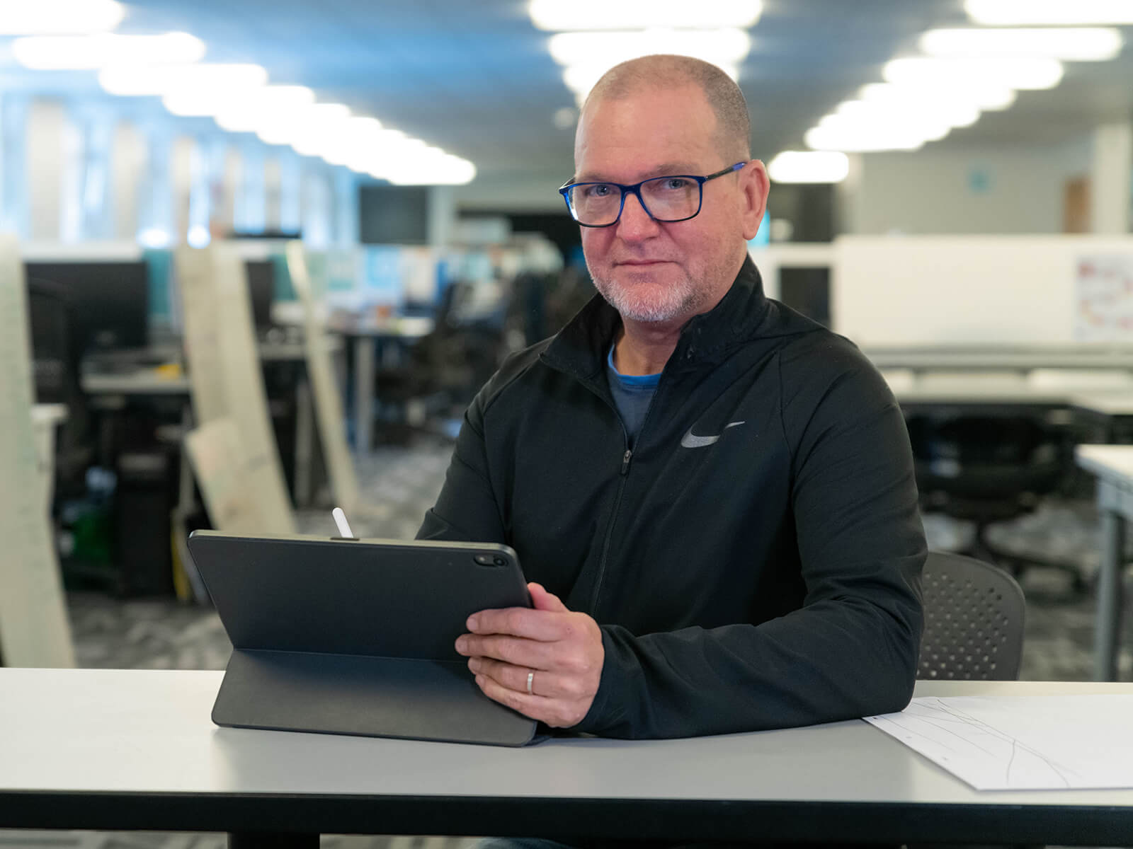 DigiPen's Jazno Francoeur sits in a computer lab