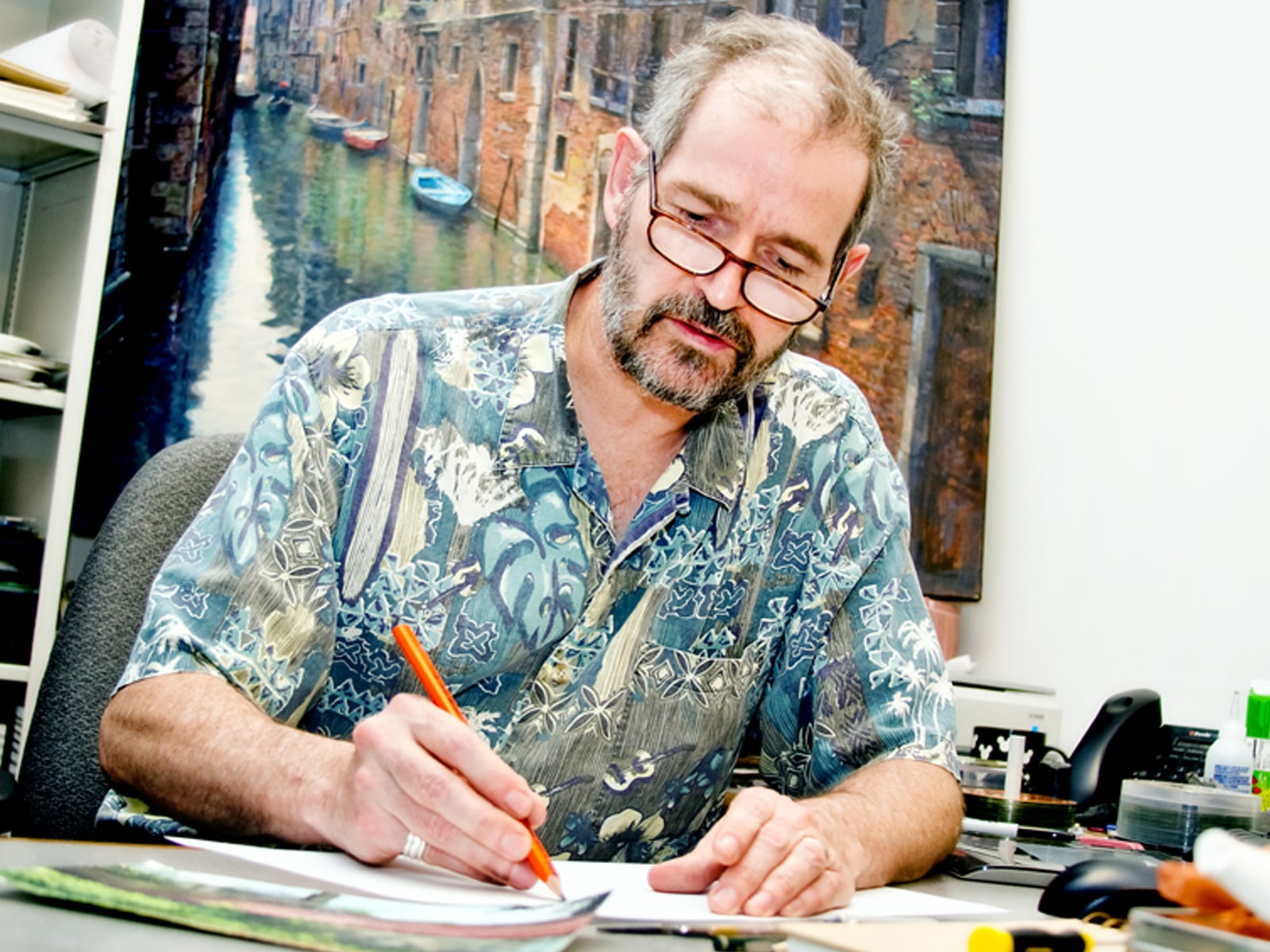DigiPen art instructor Peter Moehrle drawing in his office