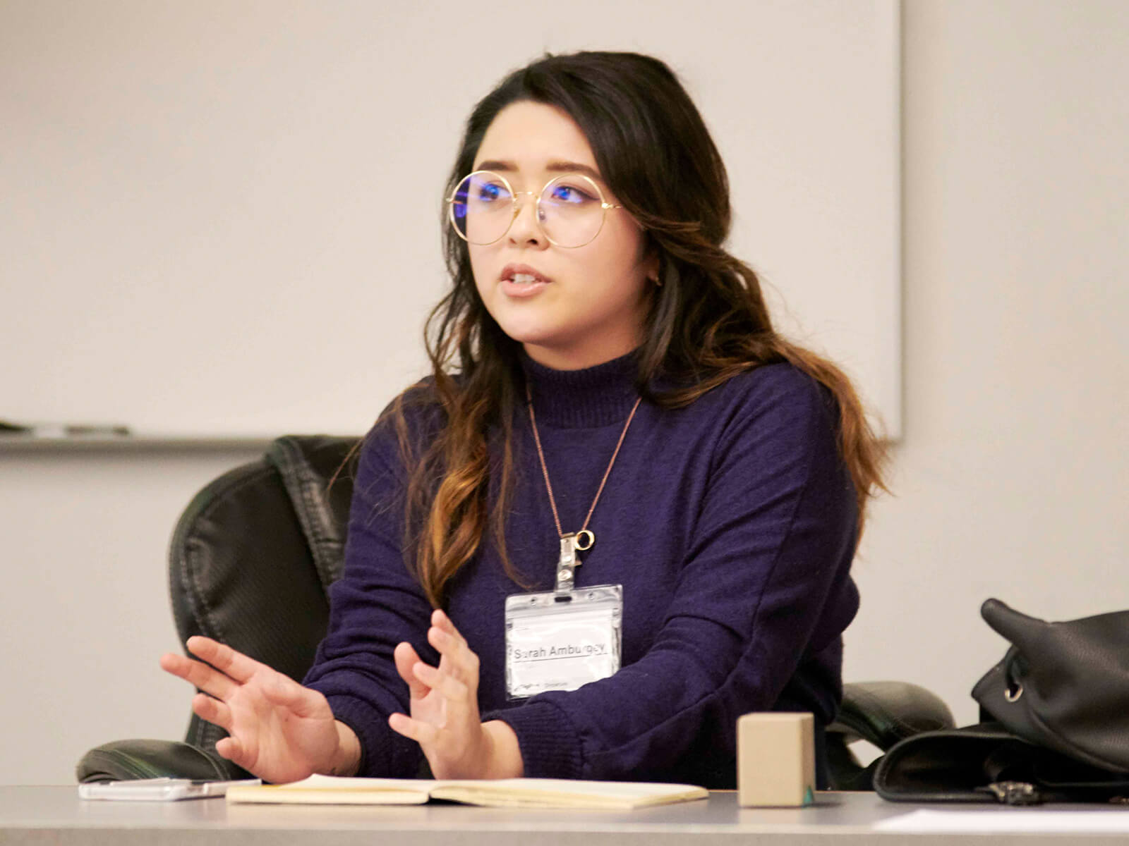 Sarah Amburgey gestures as she speaks to the audience