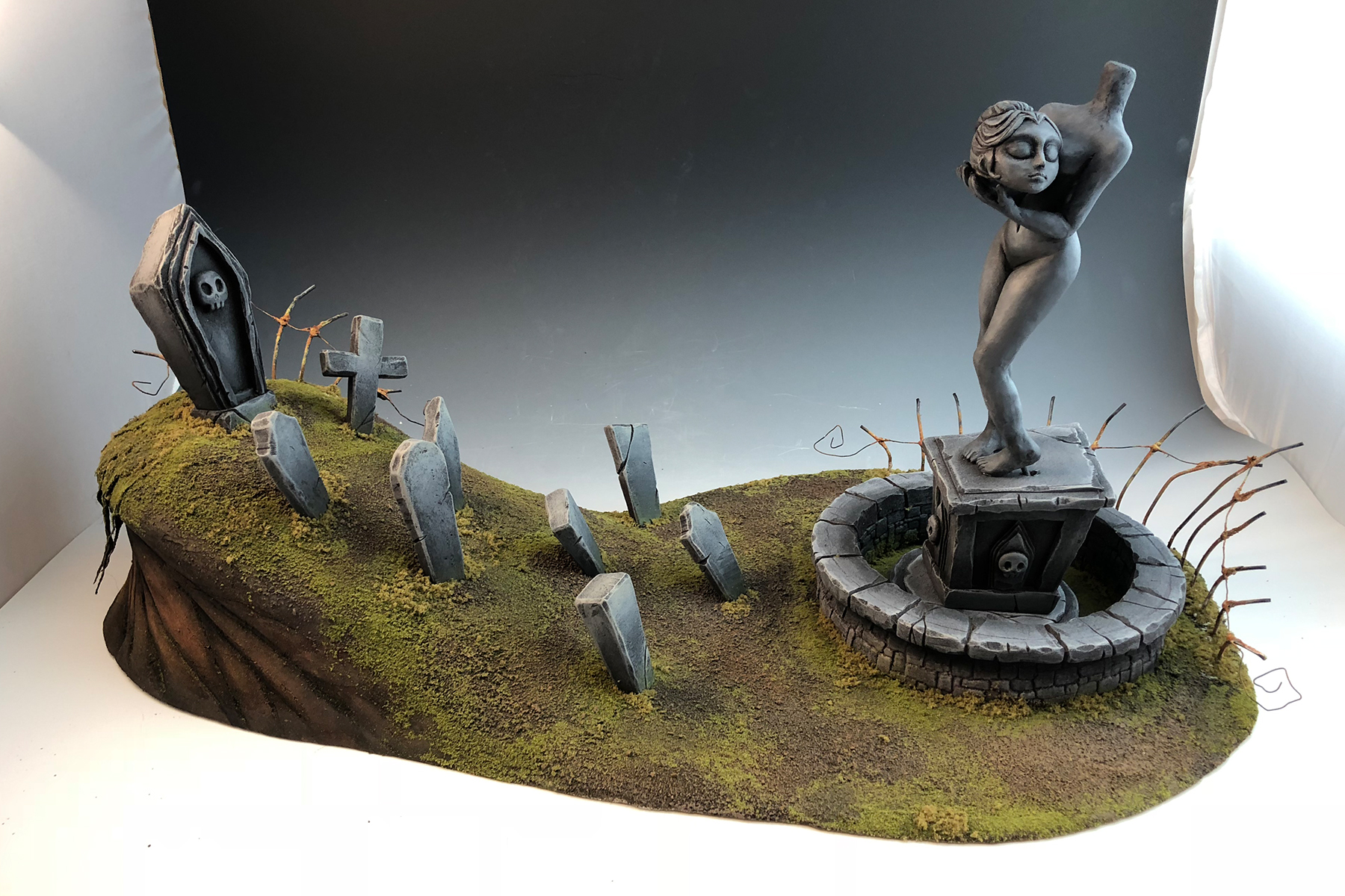 An ornate graveyard set designed and fabricated by student Abigail Snider.