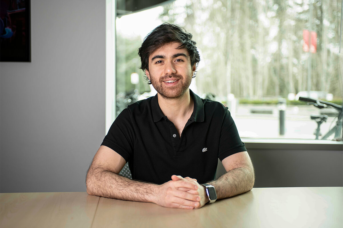 Chris Comair, DigiPen's COO, smiling in a conference room