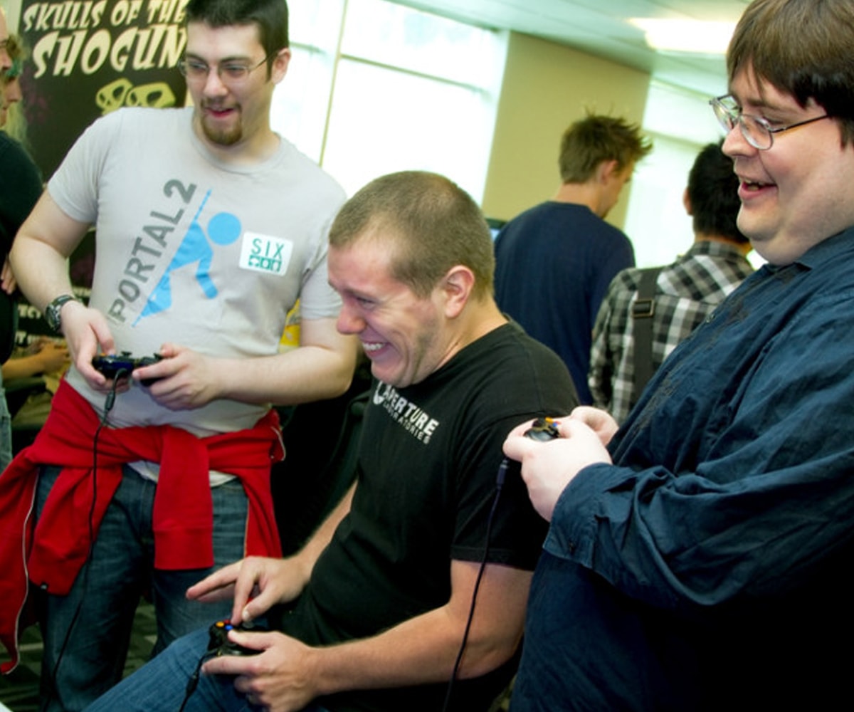 DigiPen game design lecturer Chris Peters playing a game with students