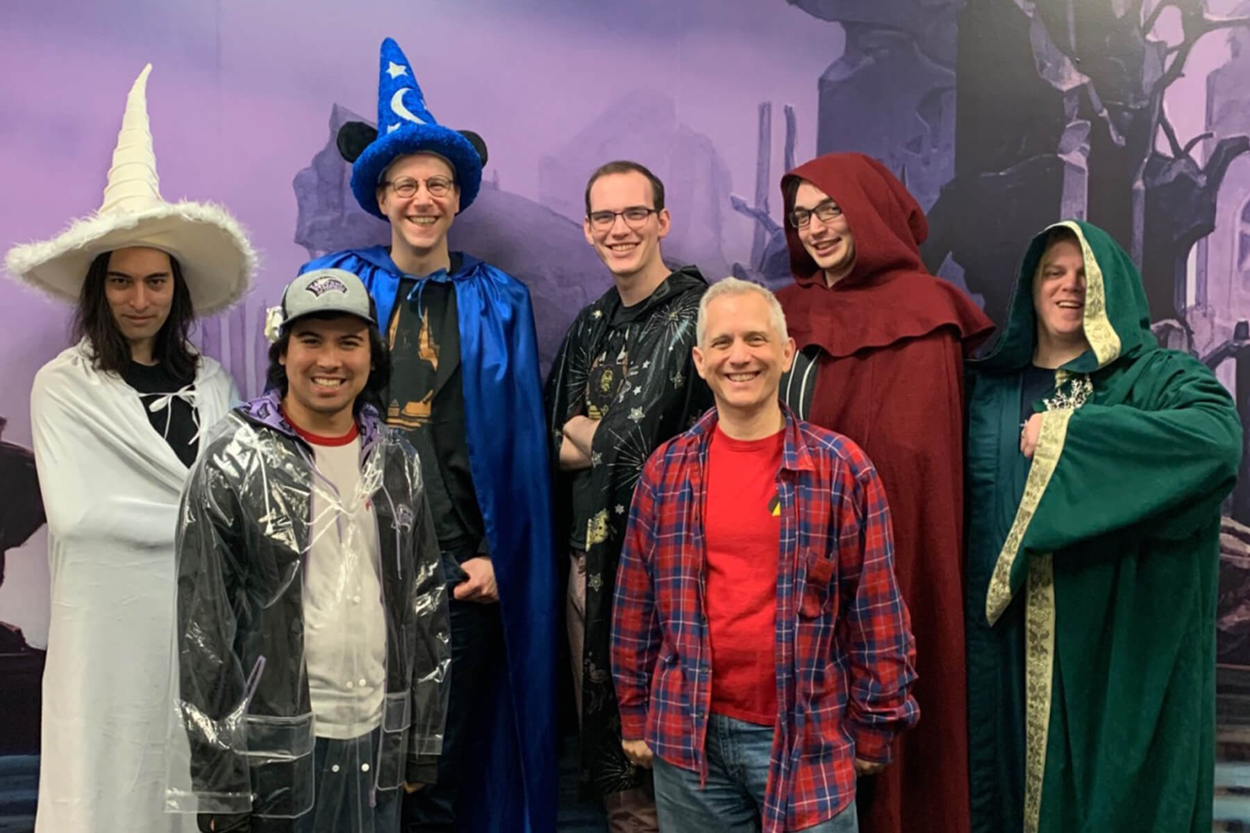 Corey Bowen and fellow Council of Colors members pose wearing variously colored wizard robes.