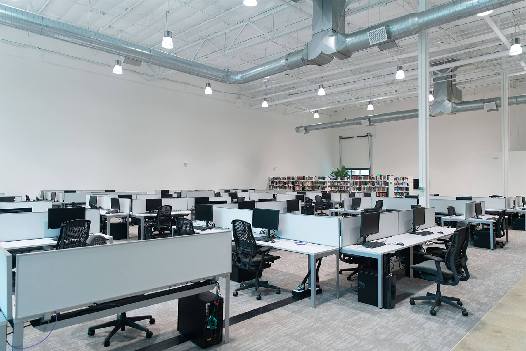 A large, open-plan computer lab and library.