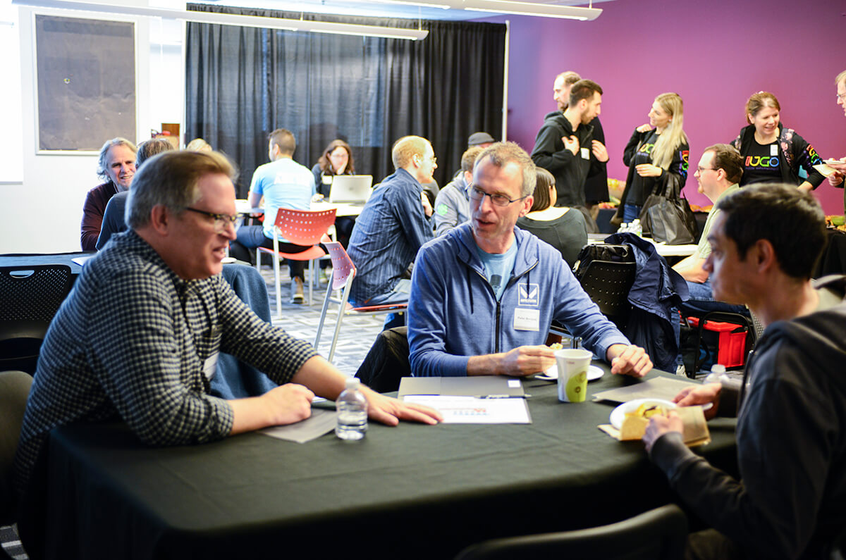 Scene from the DigiPen Career Fair employer lounge, where employers and faculty members can interact