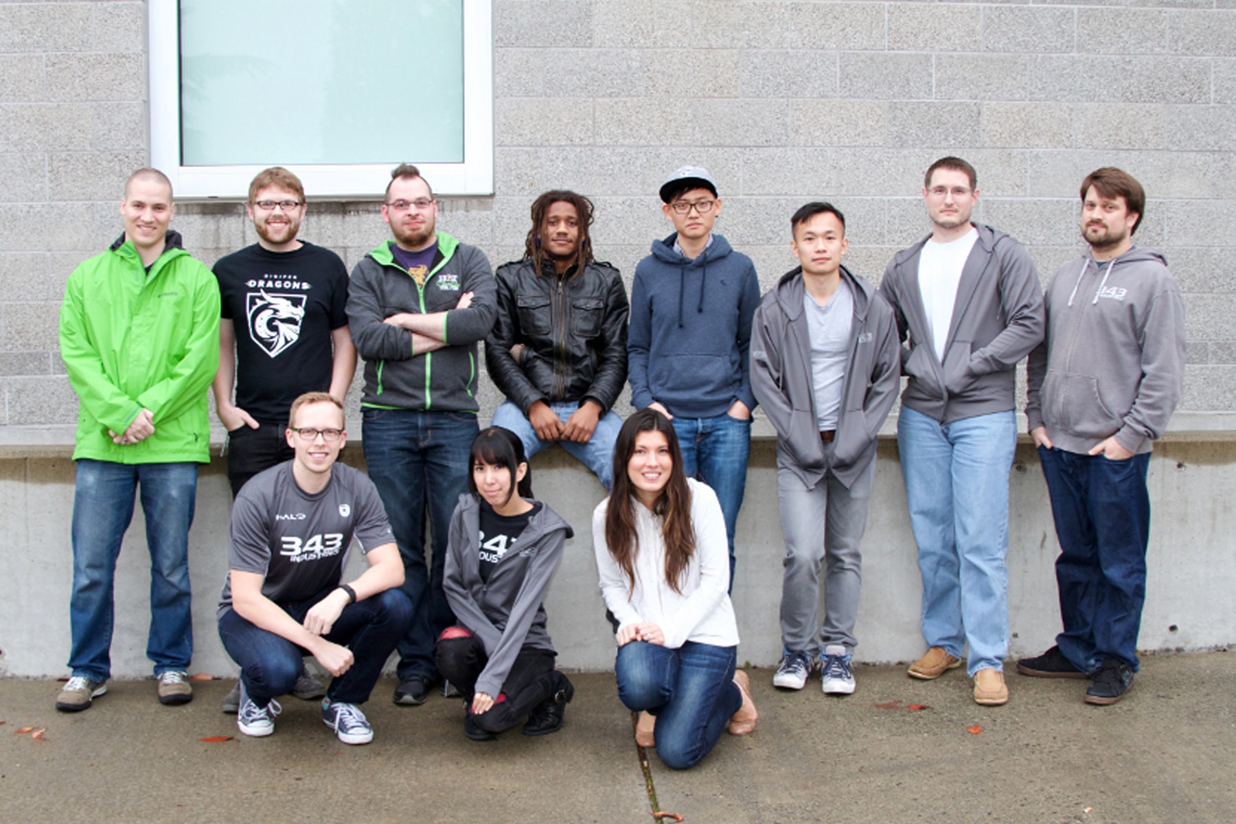 Group photo of 11 DigiPen alumni who worked on Halo 5