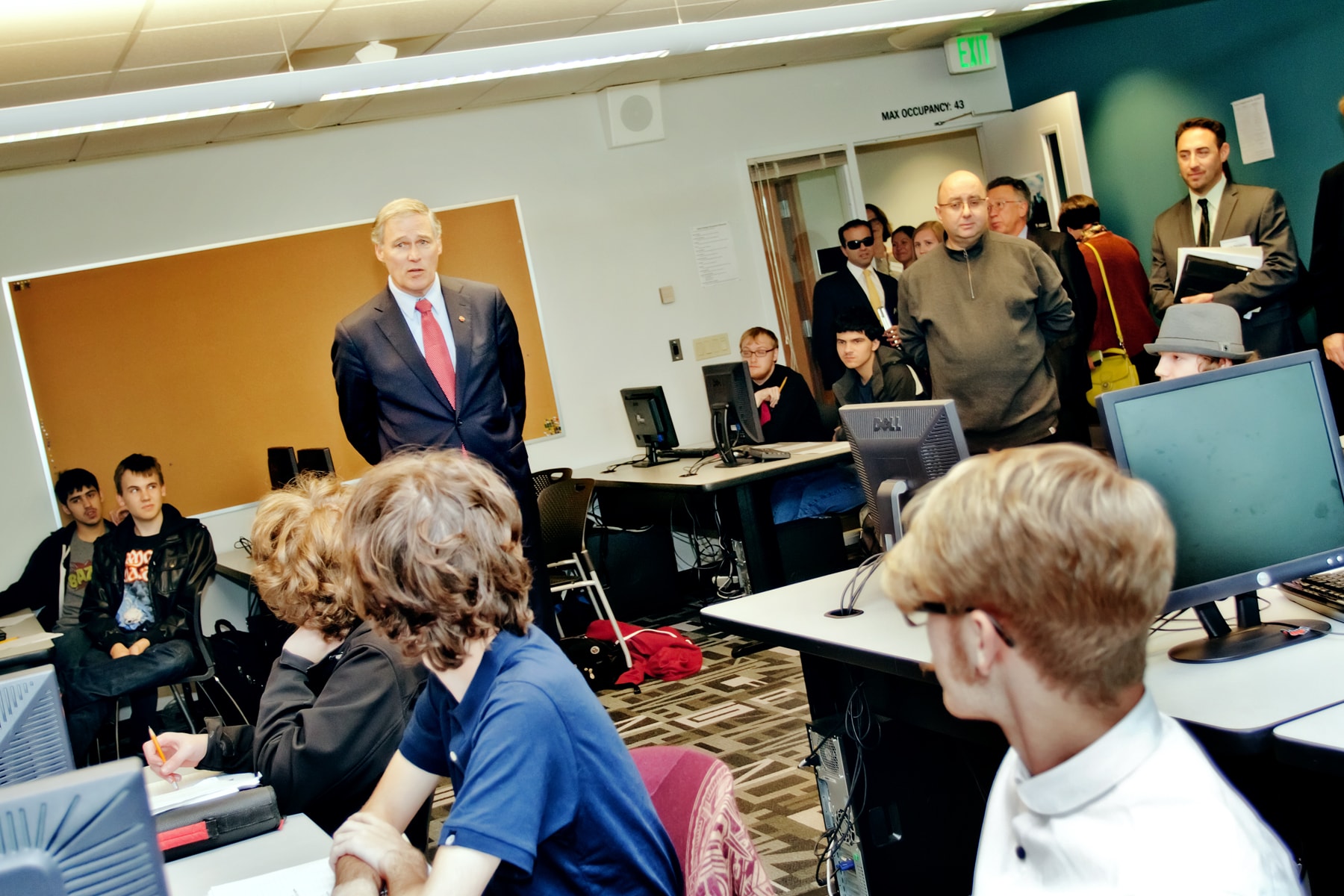 Governor Jay Inslee and Claude Comair speaking to DigiPen WaNIC students
