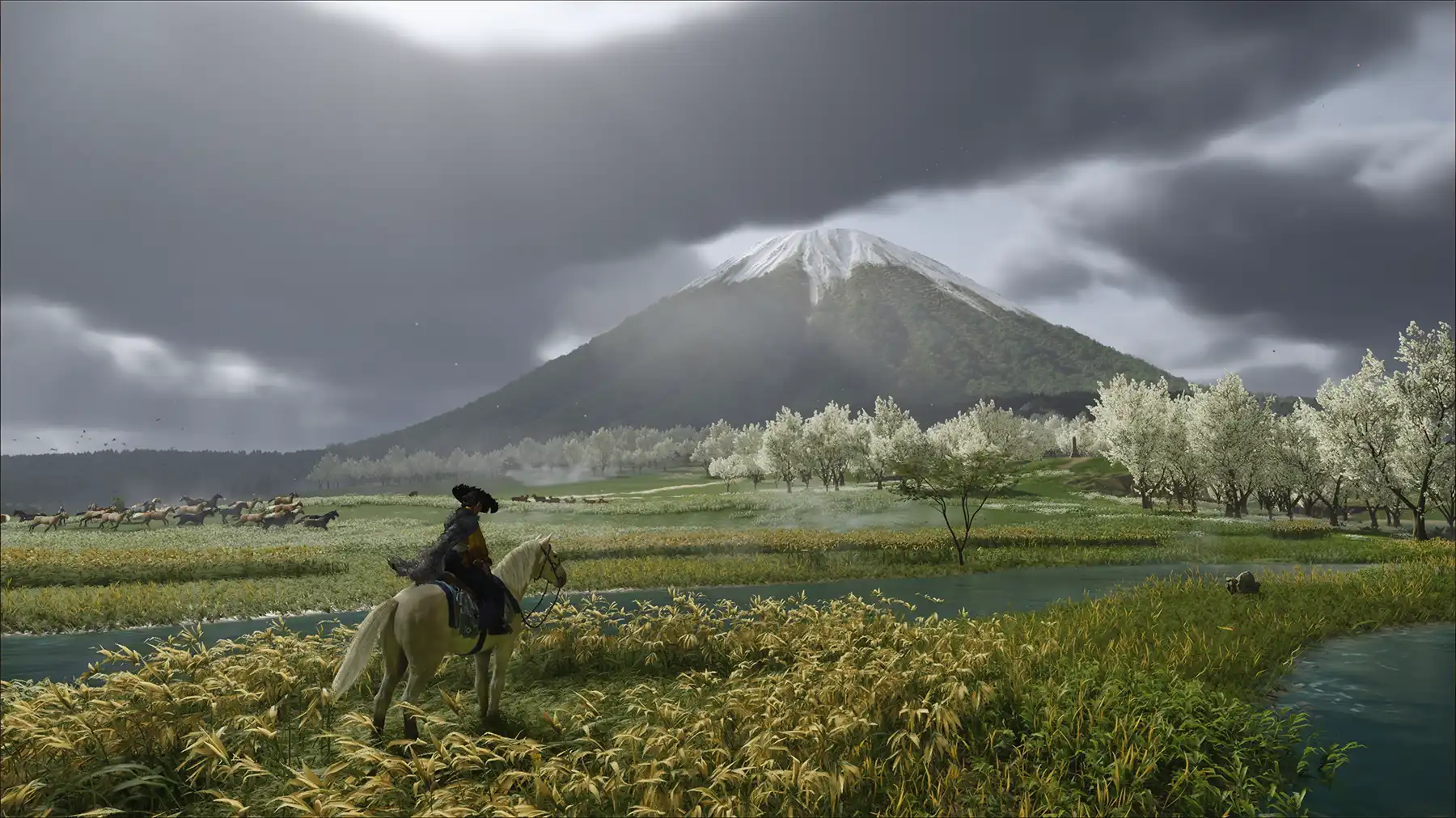 Atsu from Ghost of Yotei sits on horseback in front of the titular Mt. Yotei.