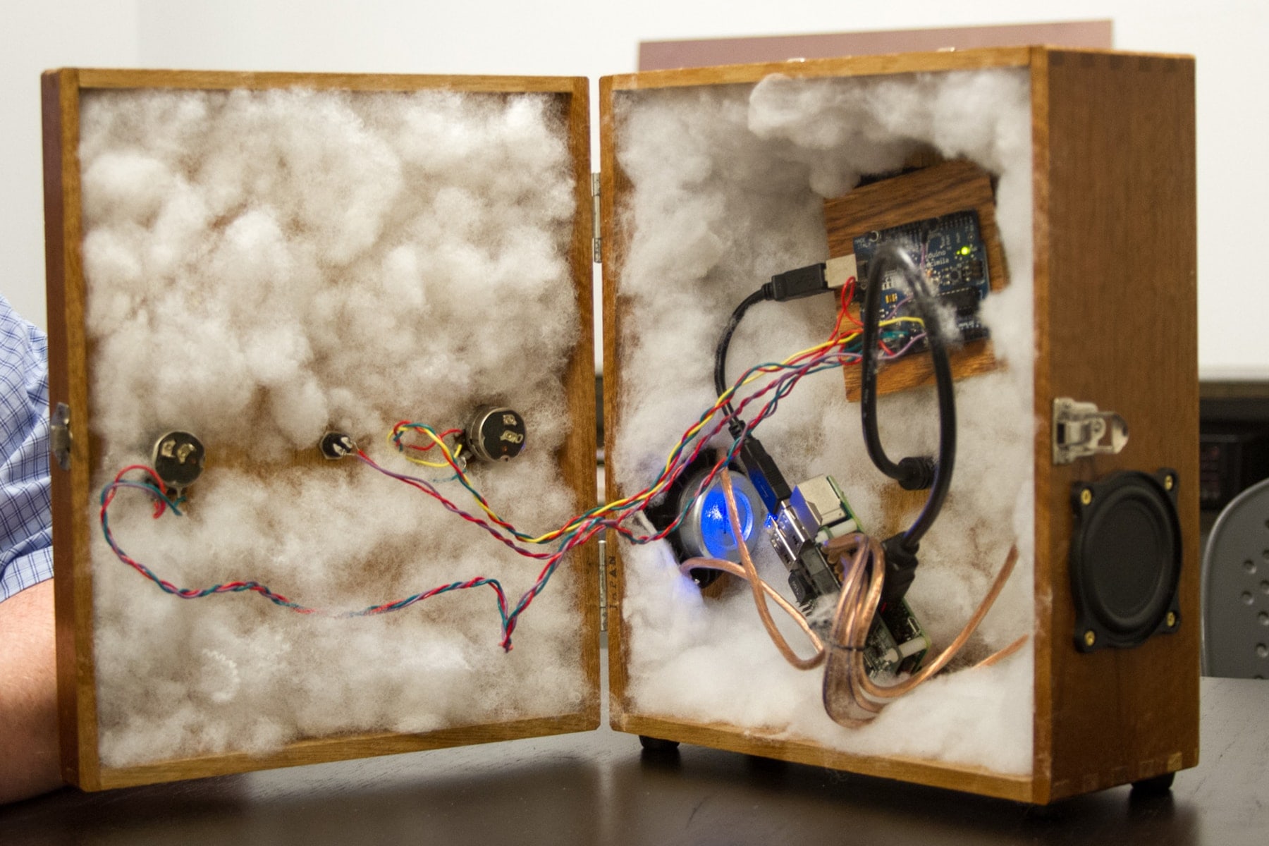 The interior of the Space Regenerator contains various hardware and wires nestled in cloud-like cotton insulation