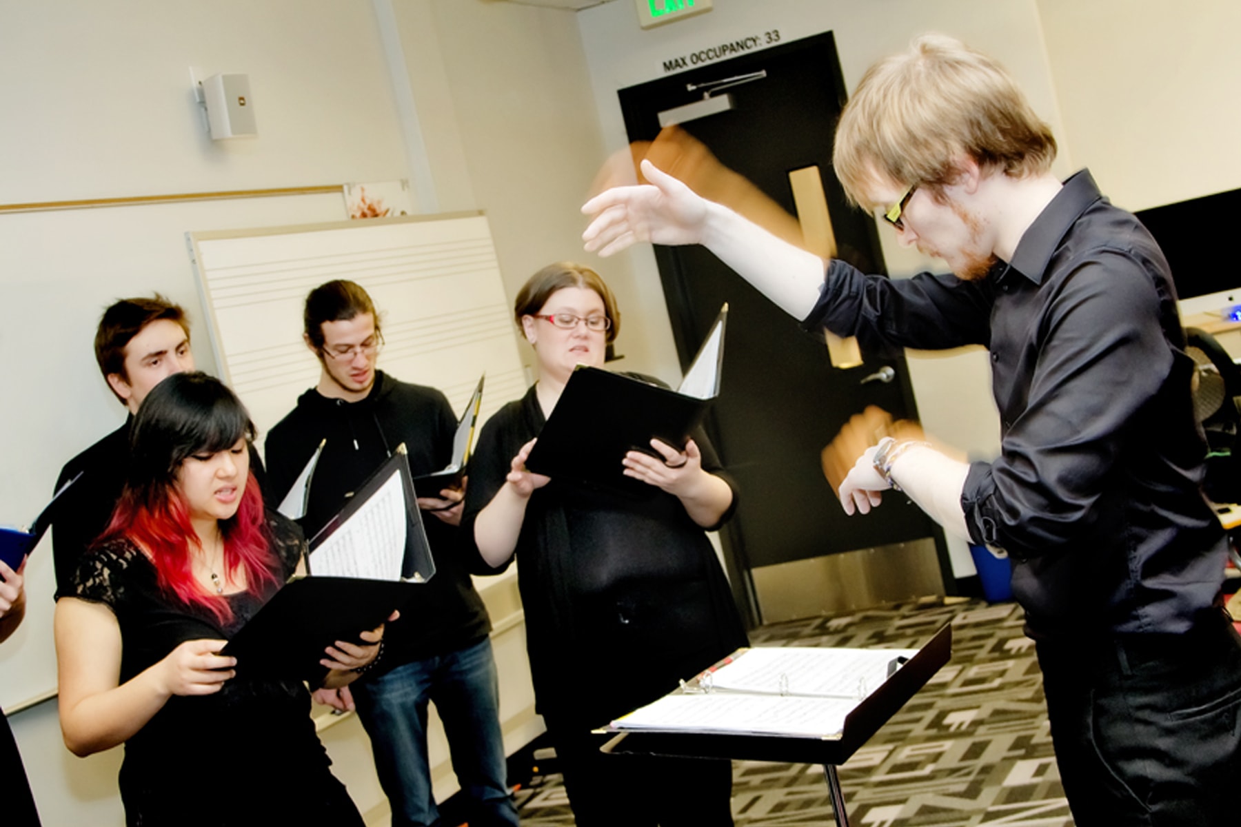 Ian Shores conducts the DigiPen game choir