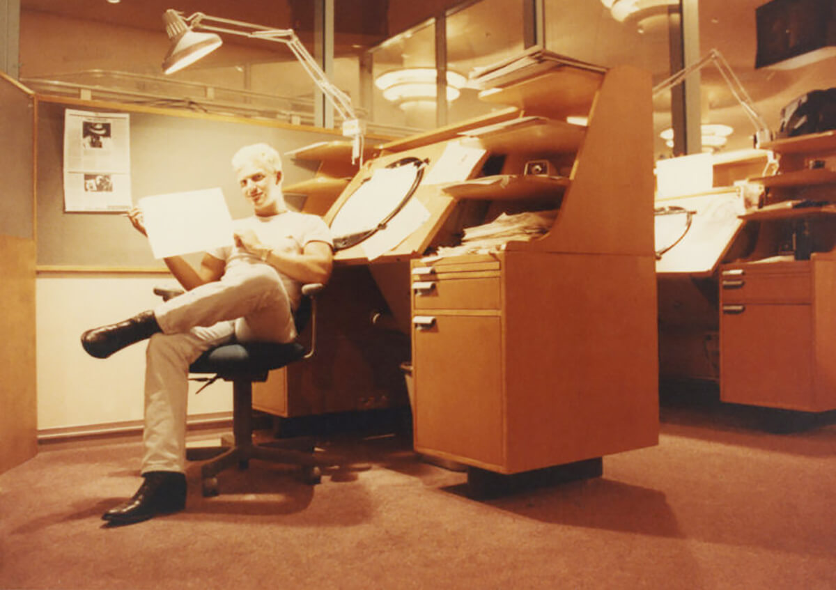 DigiPen BFA director Jazno Francoeur sitting at his first animation desk at Disney Feature Animation Florida