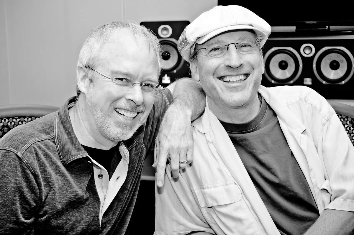 DigiPen music professor Lawrence Schwedler laughing with David Kitay in the DigiPen sound lab