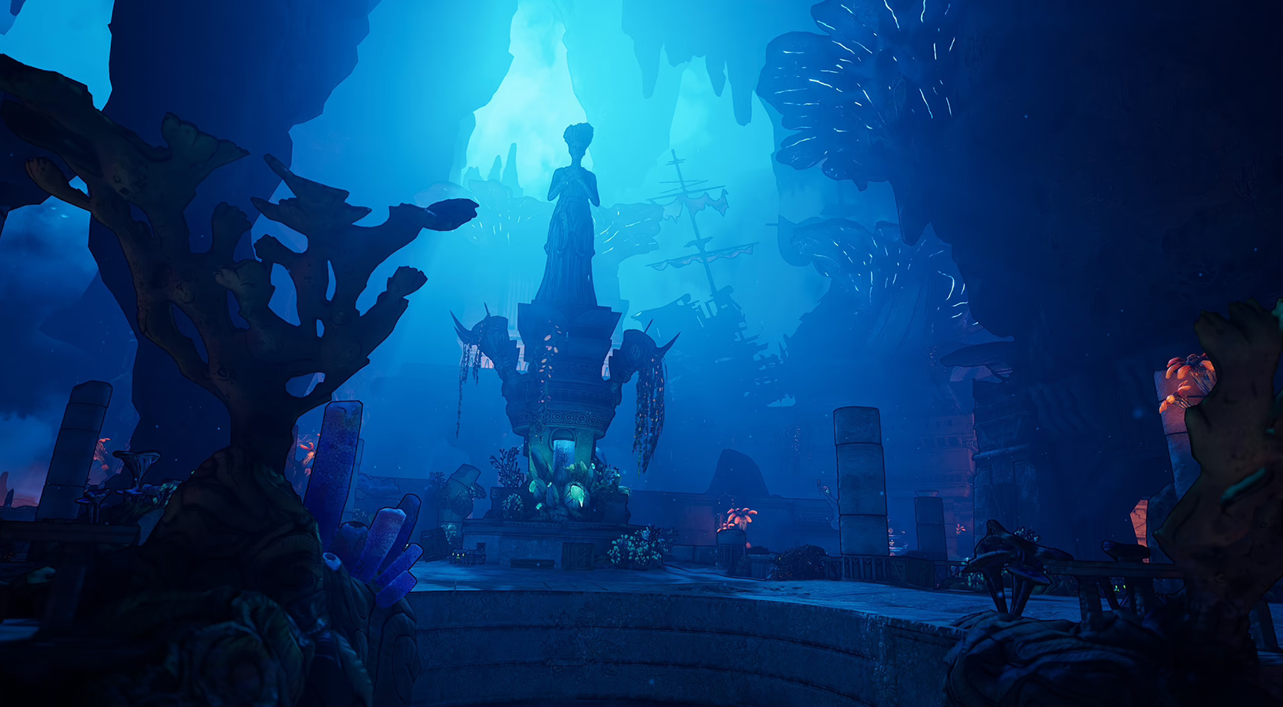 An underwater game level with a statue and coral, bathed in eerie blue light.