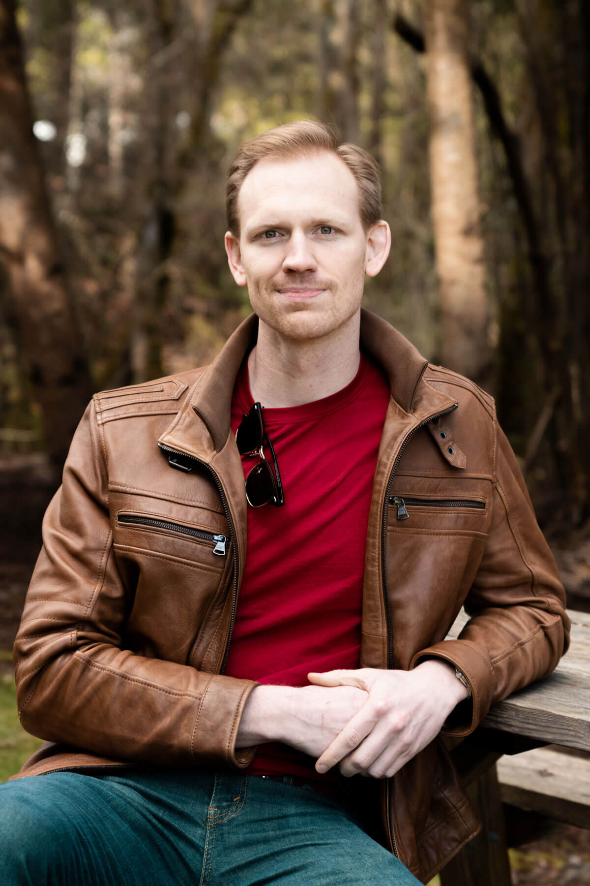 Matt Hurliman seated with trees in background